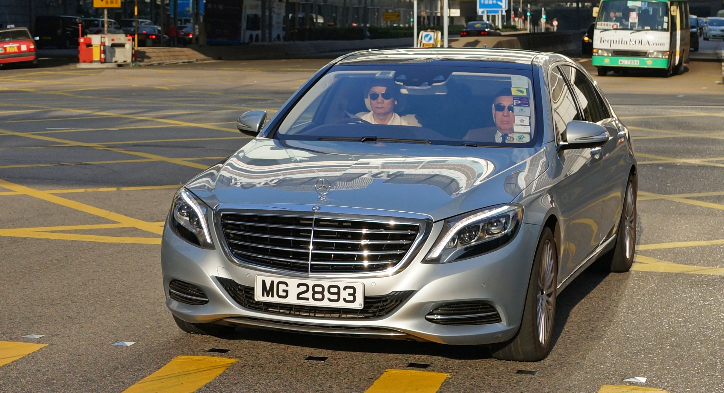 We have a misery index in Hong Kong as it is a well know fact that Hong Konger's are some of the most miserable people on the planet.. have a look at these two chaps in this gorgeous and very expensive Mercedes Benz S500, obviously this is the President and Vice President of the Hong Society of Miserable People, if it was me in this very nice car I would be pretty darn happy