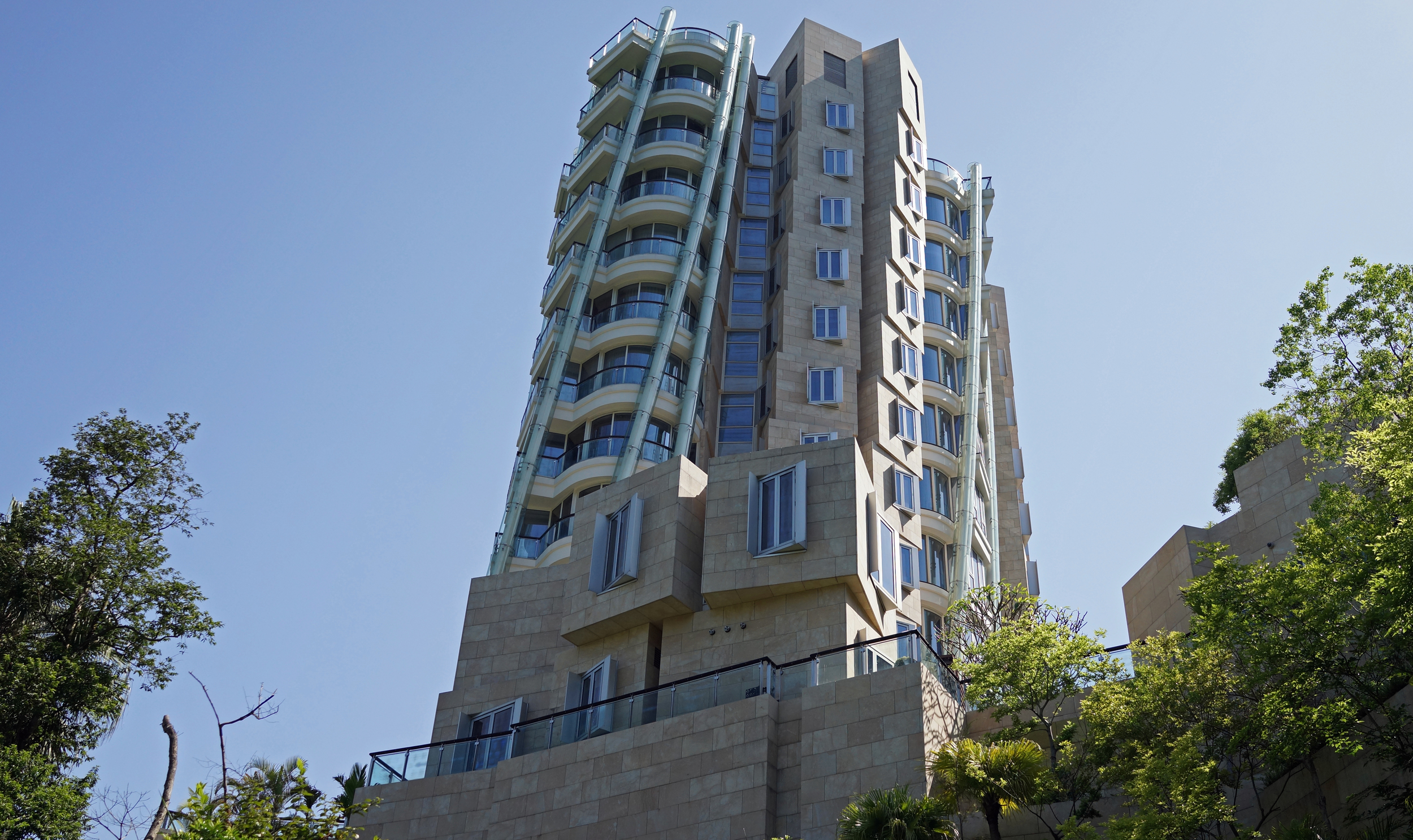 This is the Opus, Hong Kong's most expensive apartments, roughly 5,200 sqft so they are quite large and 9 of the 12 apartments have sold for roughly HK$450 million each or around US$58 million!!... oh and the British Consul General lives here for a rumoured rental of US$138,000 per month! -