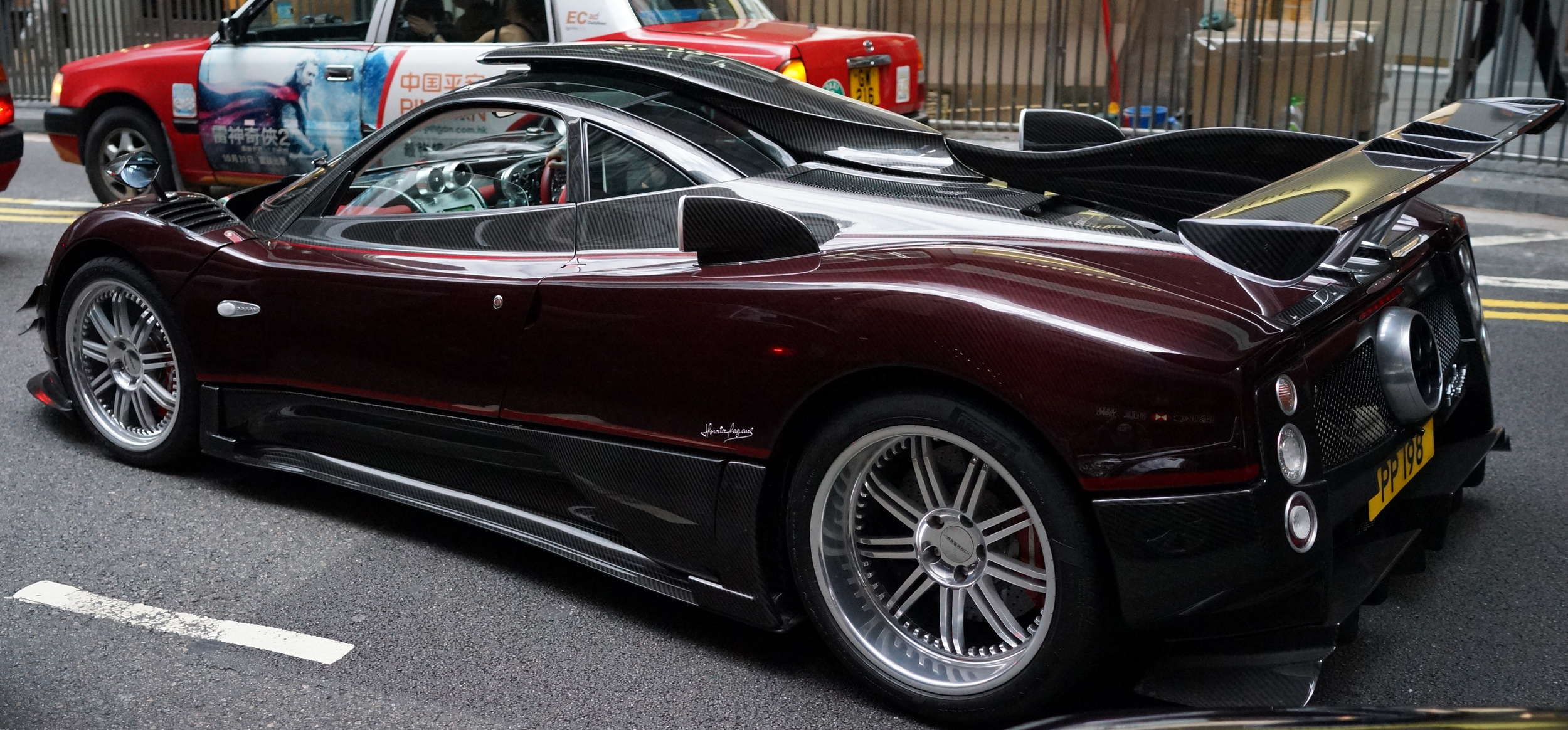 Pagani - PP 198 / A very in your face car with a very subtle number plate, essentially 198 translates to certain long life and wealth. I still remember the day I took this image, I ran into moving traffic to get the shot as for me this is simply the most amazing car in Hong Kong.