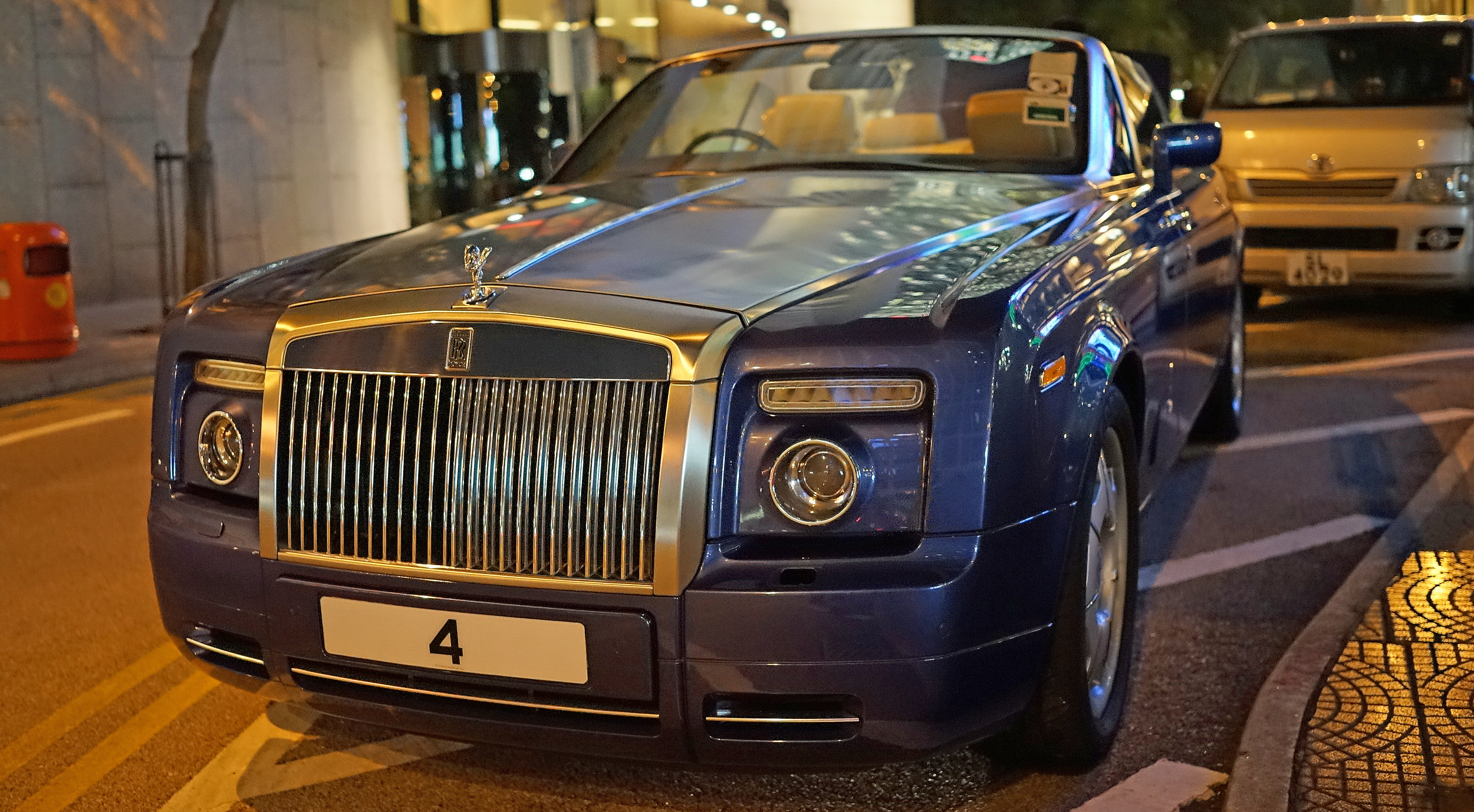 What I do means I am on the streets all the time and therefore I am lucky enough to pursue my passion of car number plates - single digit plates are highly prized in Hong Kong and this is NOT my first image of this car but it is my best image. oh, 4 translates to DEATH! This was taken outside the Hong Kong Club where the billionaires hang out!