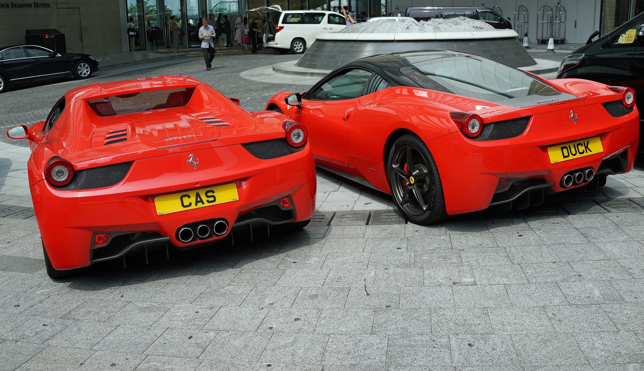 The fabulous Four Seasons Hotel in Hong Kong is a great place to view fancy cars - how about these two amazing Ferrari's then!!