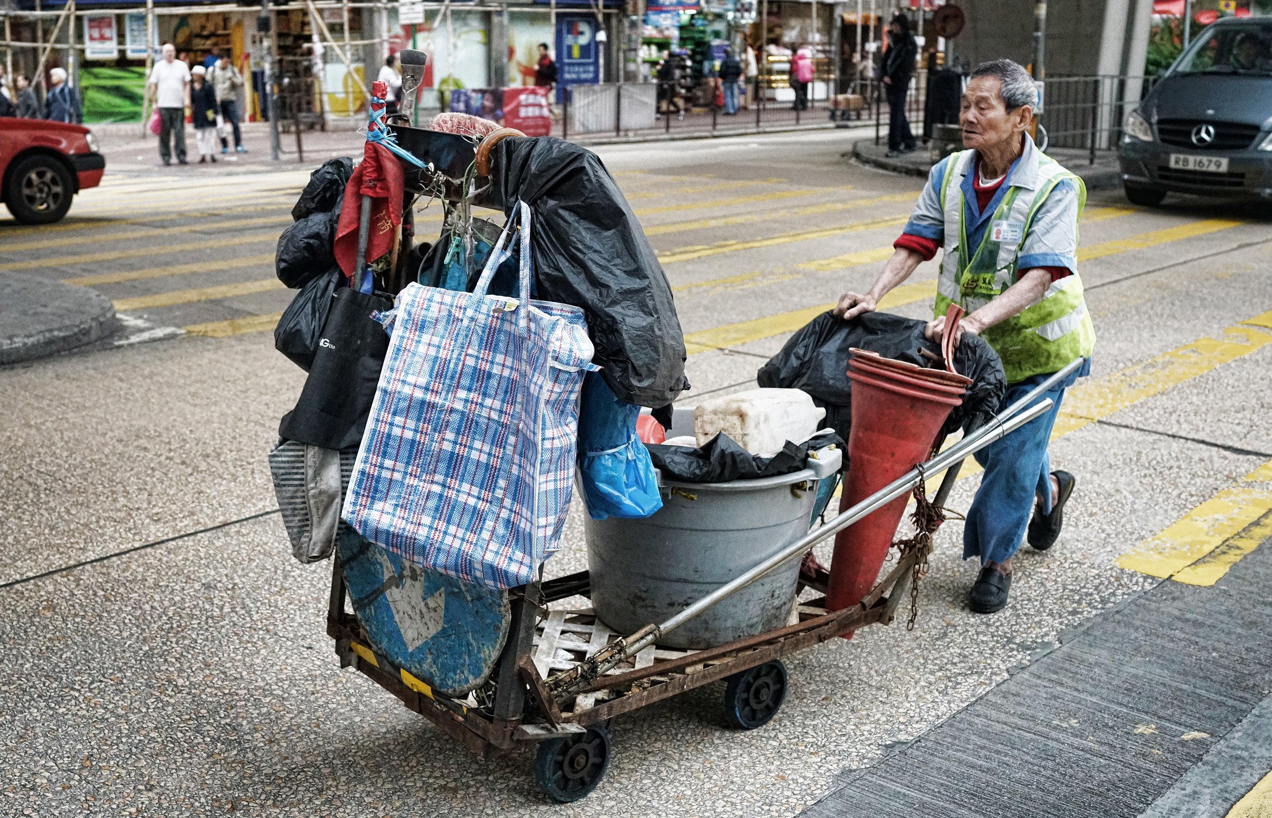 This old geezer to me is a bit of a tragic figure as he cleans the streets around Tai Kok Tsui in Kowloon.... it is about time he was at home with his feet up, watching the tele and drinking a cup of hot coco... the reality is a little grimmer as you can see