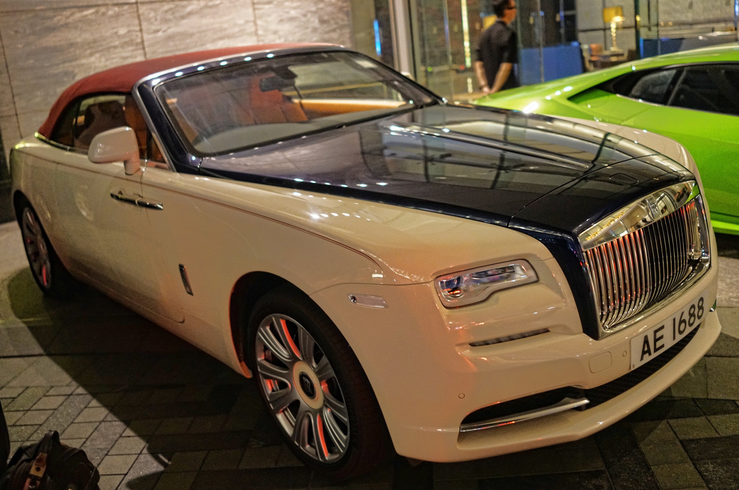 Oh Lordy, the new Rolls Royce Dawn and what a simply stunning car, love the number plate as well, it is a very lucky number is 1688... I like visiting the Ritz Carlton Hotel.. always lots of lovely cars parked there and the view from the lobby on the 103rd floor is stunning.