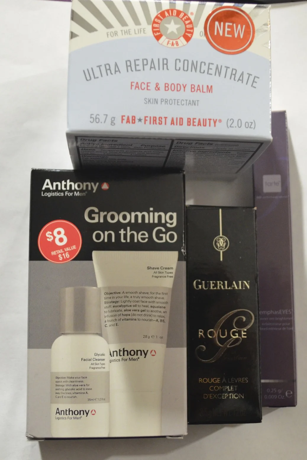 first aid beauty ultra repair concentrate, anthony logistics grooming on the go, guerlain rouge g gigolo, tarte emphaseyes inner rim brightener