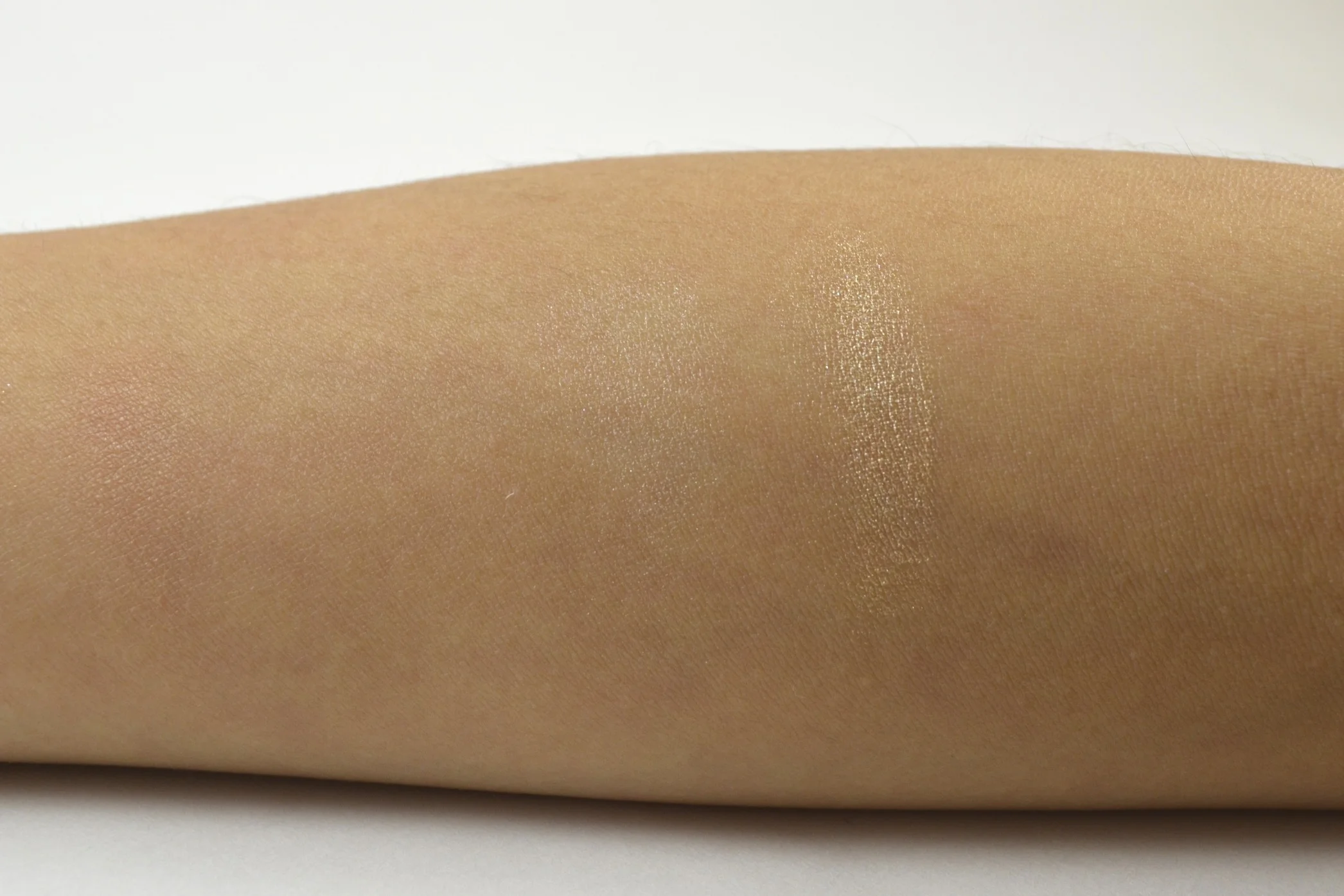 jouer highlighter tiare and camellia swatches