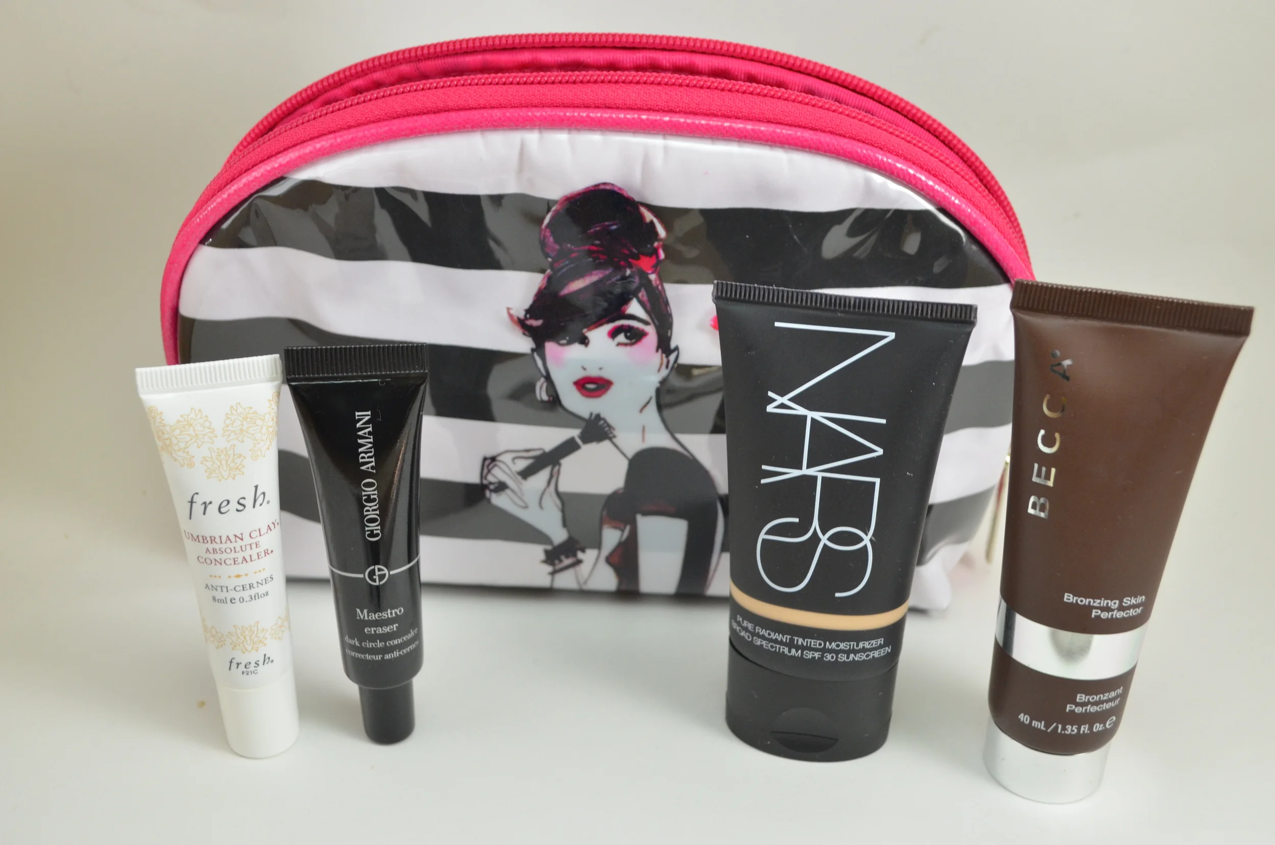 Sephora Izak makeup bag, Fresh umbrian clay concealer, armani maestro eraser, nars tinted moisturizer, becca bronzing perfector