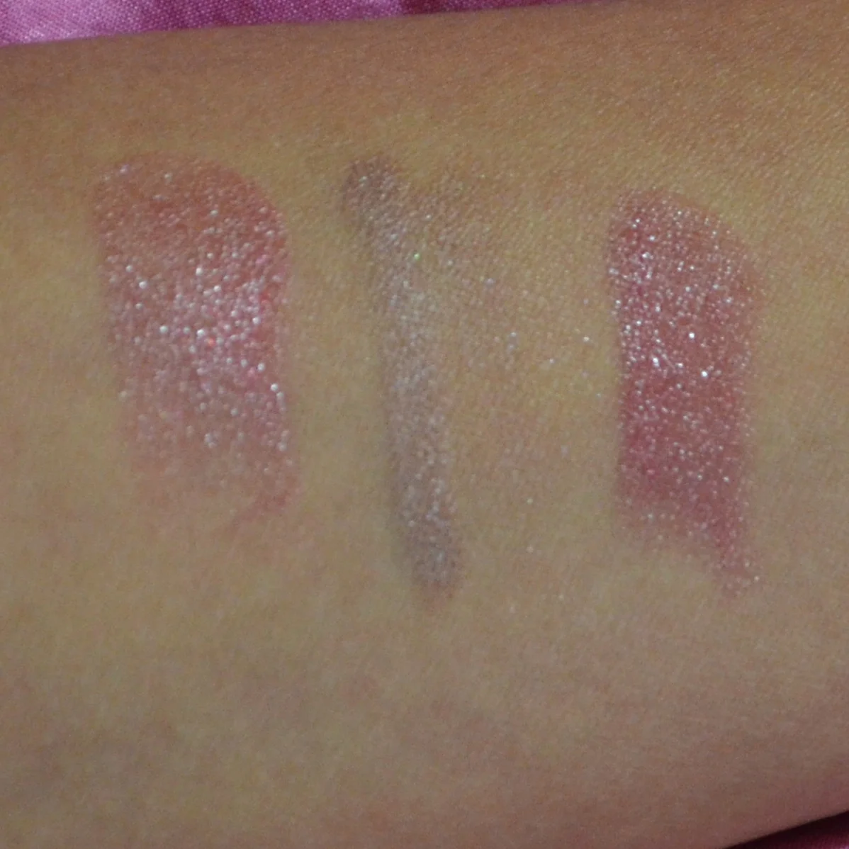 Swatches L-R: Revlon Lip Butter in Berry Smoothie, Becca Eye Tint in Baroque, Nars Lipstick in Damage