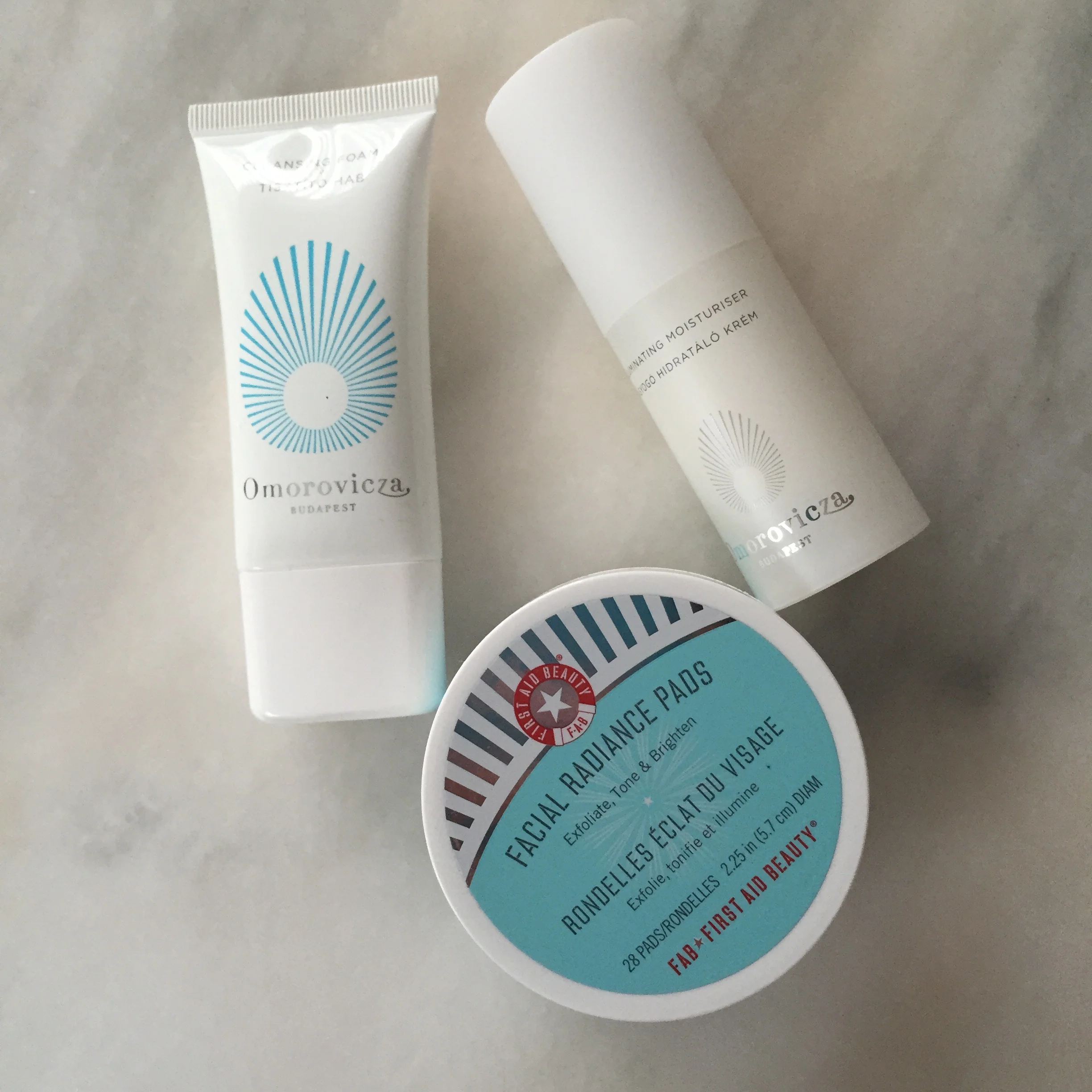 Day 4: Omorovicza Cleansing Foam, First Aid Beauty Facial Radiance Pads, Omorovicza Illuminating Moisturizer