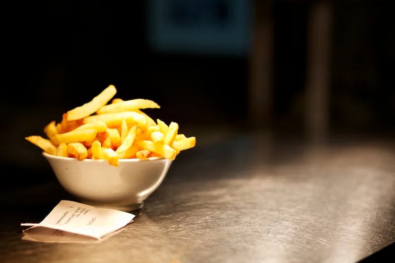 bowl of chips on the pass at The Priory Inn