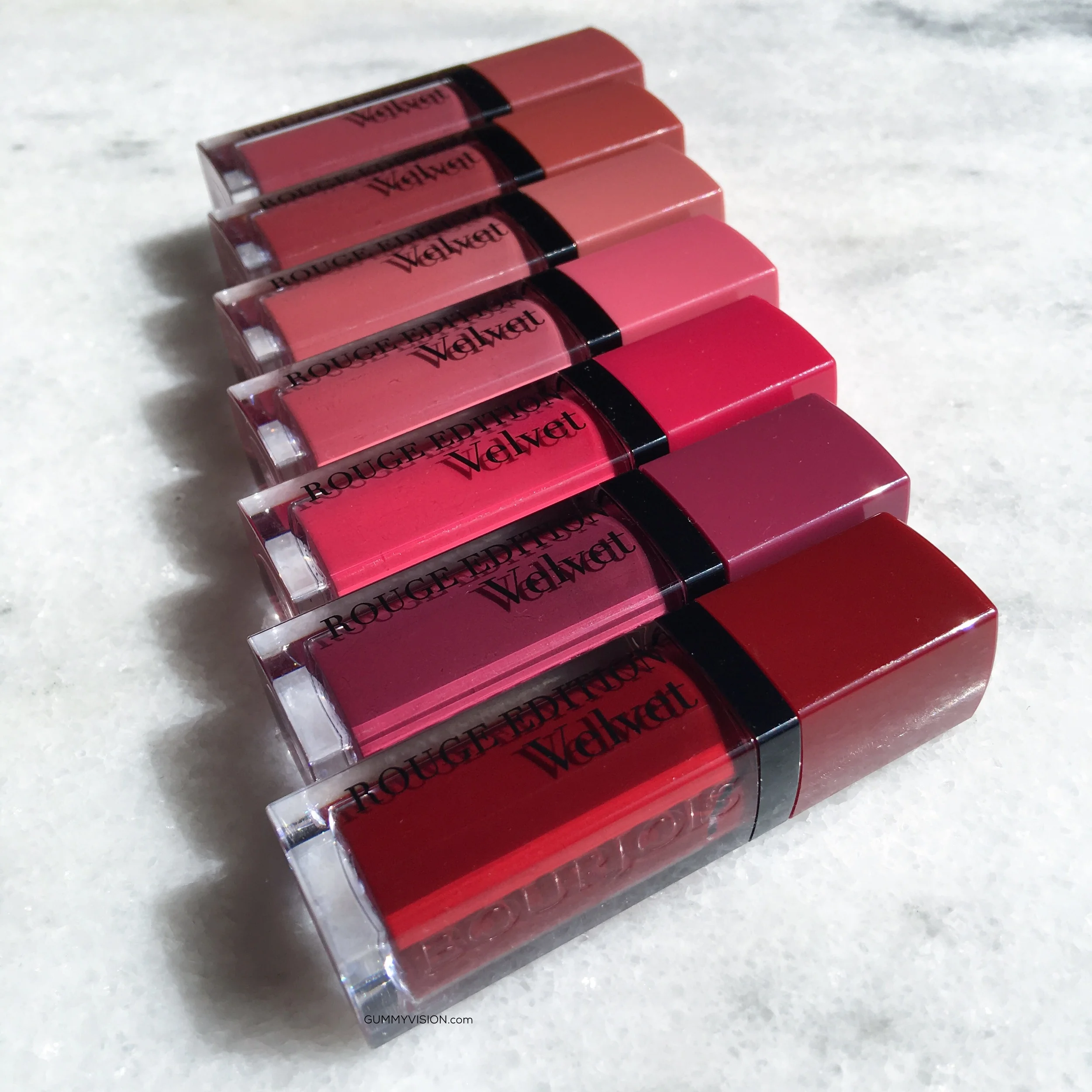 Bourjois Rouge Edition Velvet Lipsticks (Top to Bottom): 07 Nude-ist, 12 Beau Brun, 09 Happy Nude-Year, 11 So Hap'pink, 05 Ole Flamingo, 14 Plum Plum Girl, 08 Grand Cru