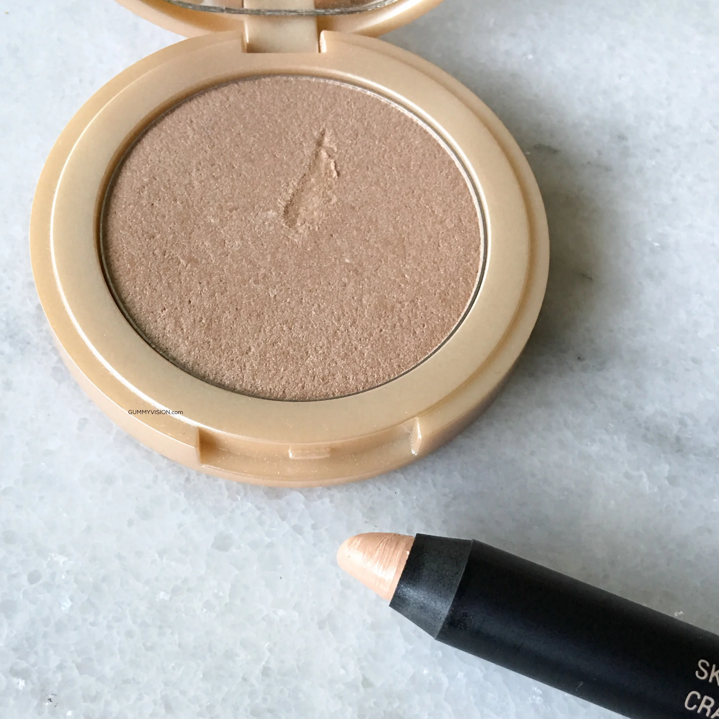 NUDESTIX Skin Glossing Pencil and the Tarte Amazonian Clay 12-hr Highlighter in Exposed Highlight 