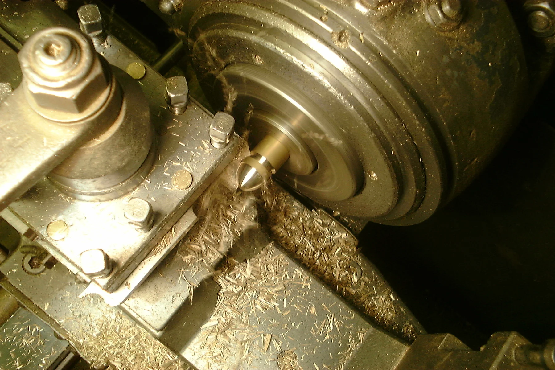 Solid Premier stair rods being turned on a lathe - the initial stage of production.