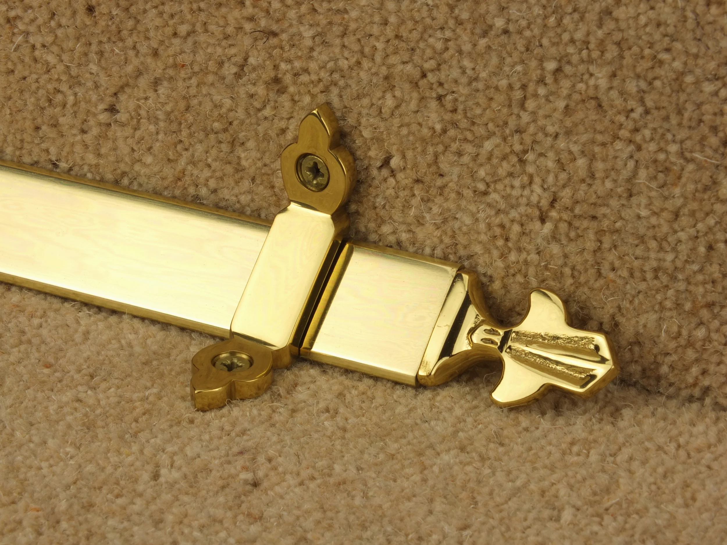 stairrods-brass-triangular-fleur-de-lys.jpg