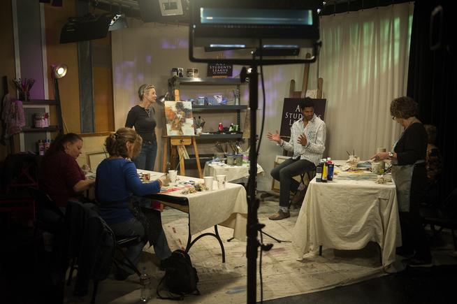 Michael Gadlin, host of "Art Scene," talks with Karen Roehl of Art Students League of Denver on Oct. 20 during a taping of the show in Studio D in the City and County Building. ( Seth McConnell, YourHub )