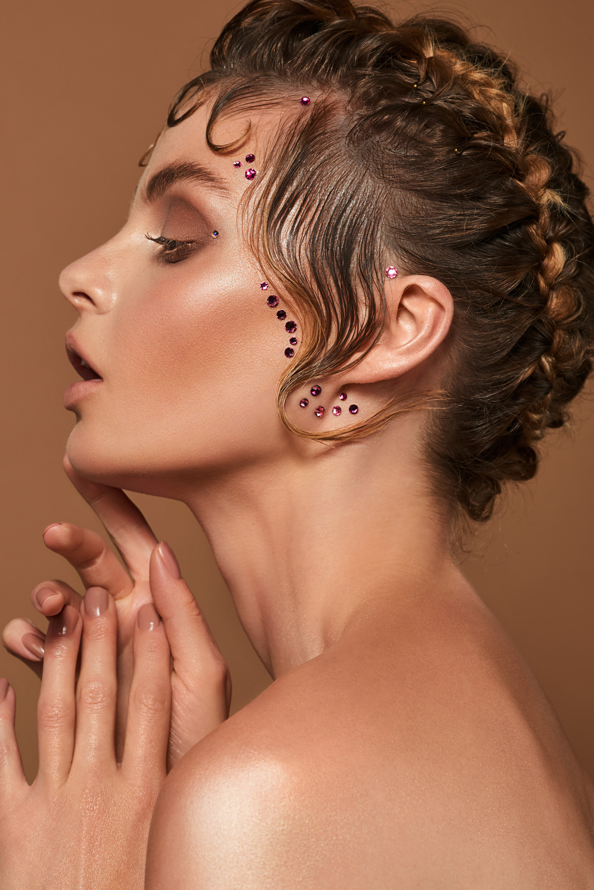 1920's kiss curls hair shoot with creative face gems on models face