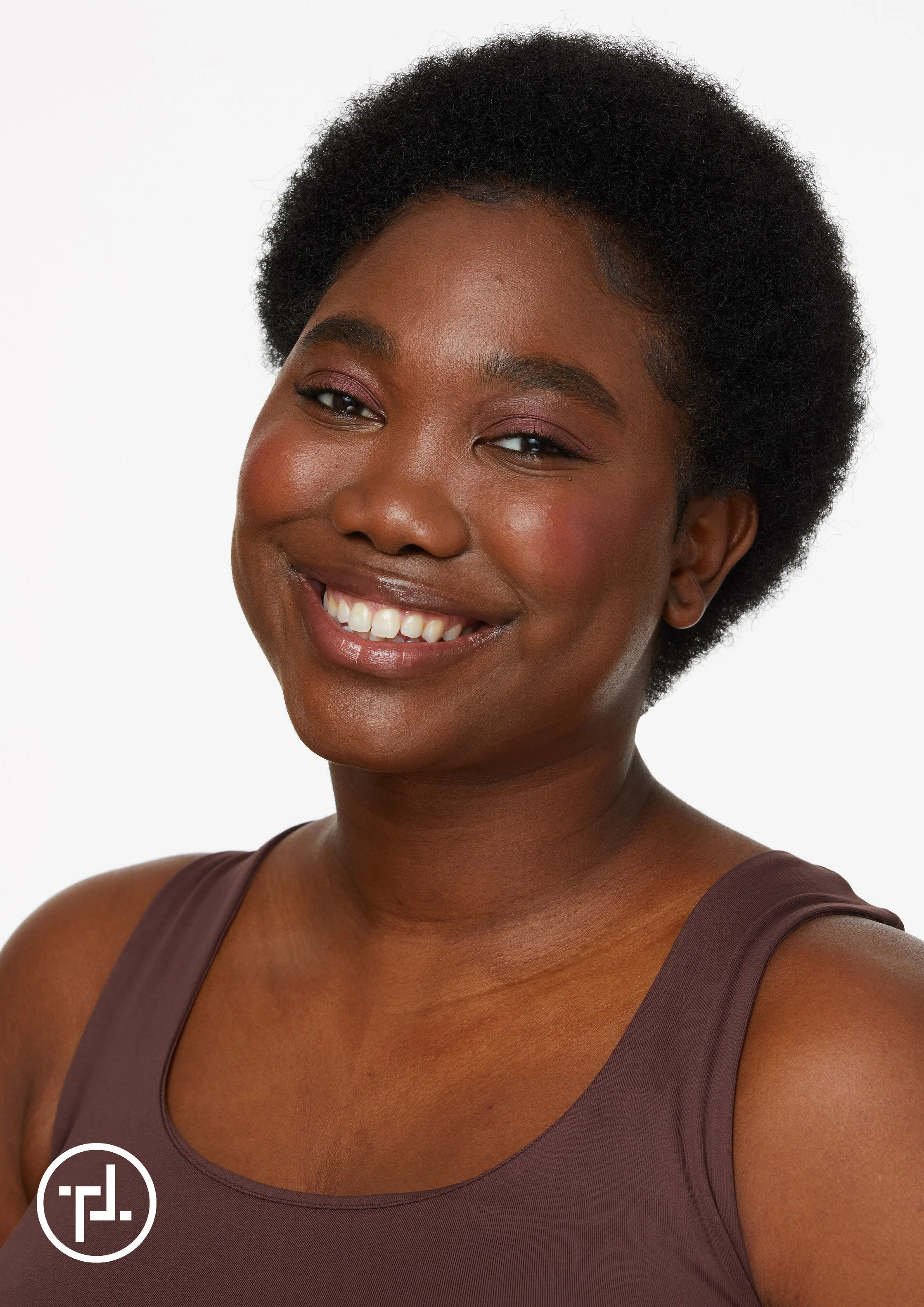 Black beauty model wearing Trinny London makeup for cosmetics beauty shoot