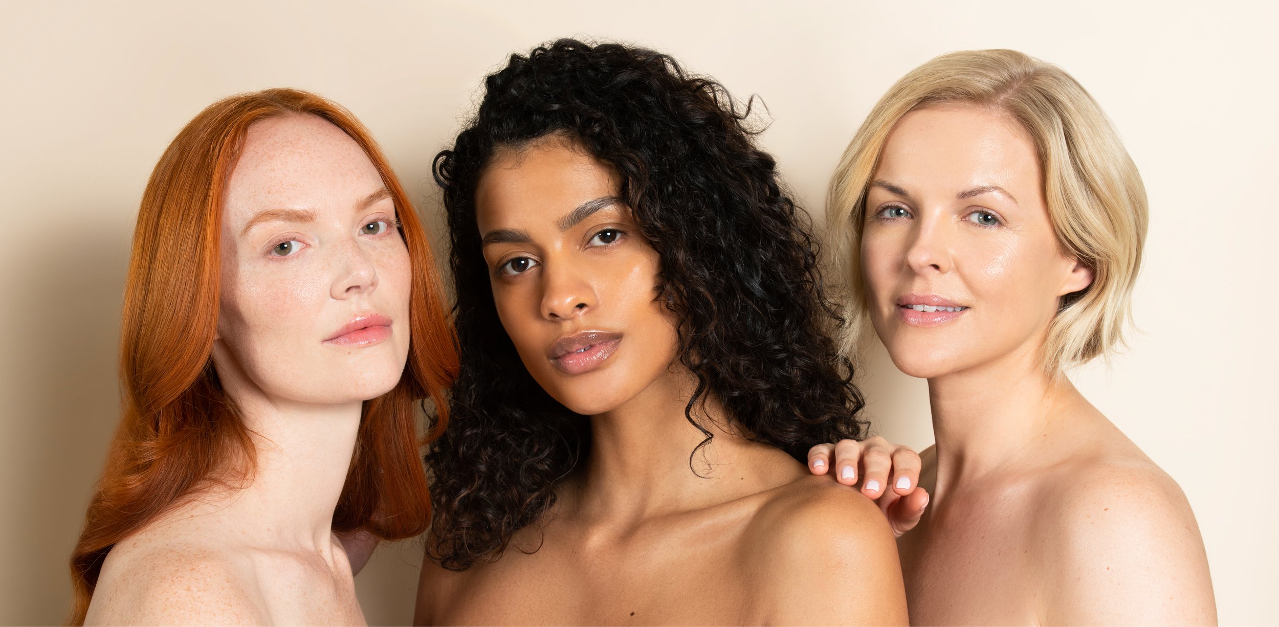 Three beauty models showing of their moisturised skin for Olivanna skincare photoshoot