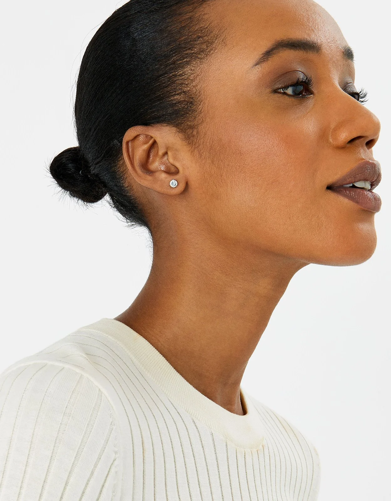 Model wearing Accessorize earrings during jewellery photoshoot