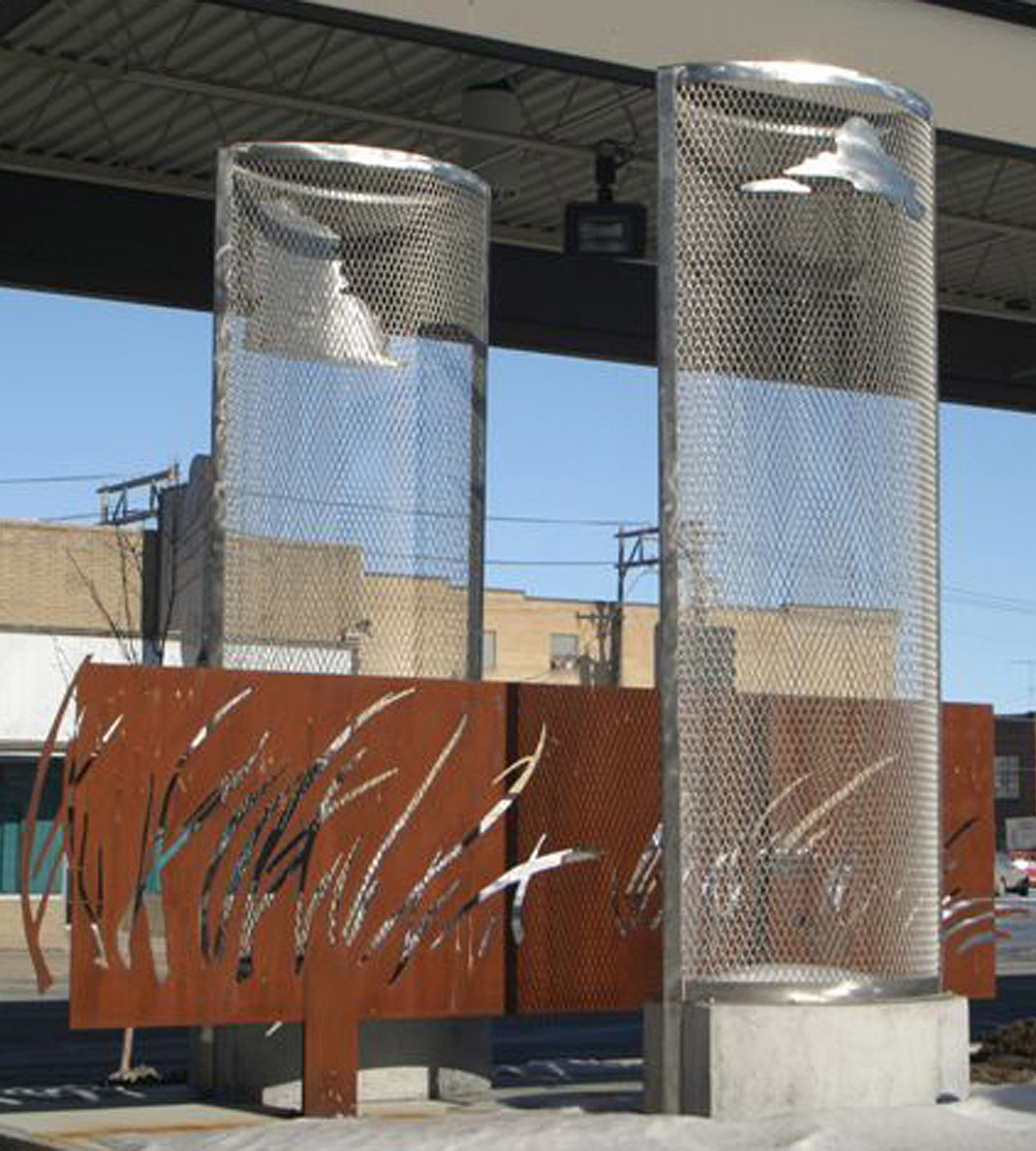   Earth : Heaven / Prairie : Sky , Fargo Metro Transit, 12' x 8' x 14'​, stainless steel expanded metal, Corten steel, concrete.   