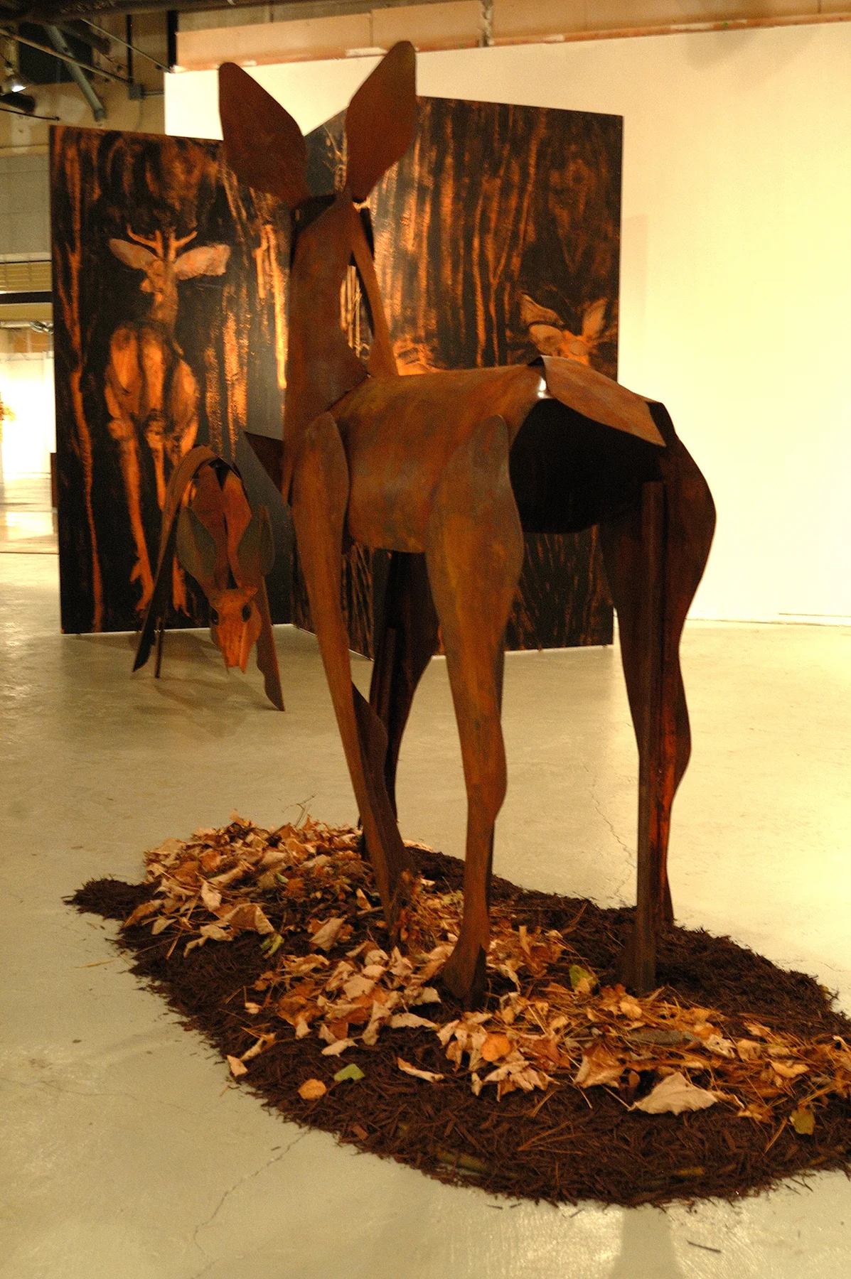 "Living Room" was a one-person show at Gallery 13, 811 LaSalle St., Minneapolis, MN.
The animals are life-size, Corten steel, the panels, both freestanding
and wall-hung, are each 4' x 8' plywood, painted in asphaltum.