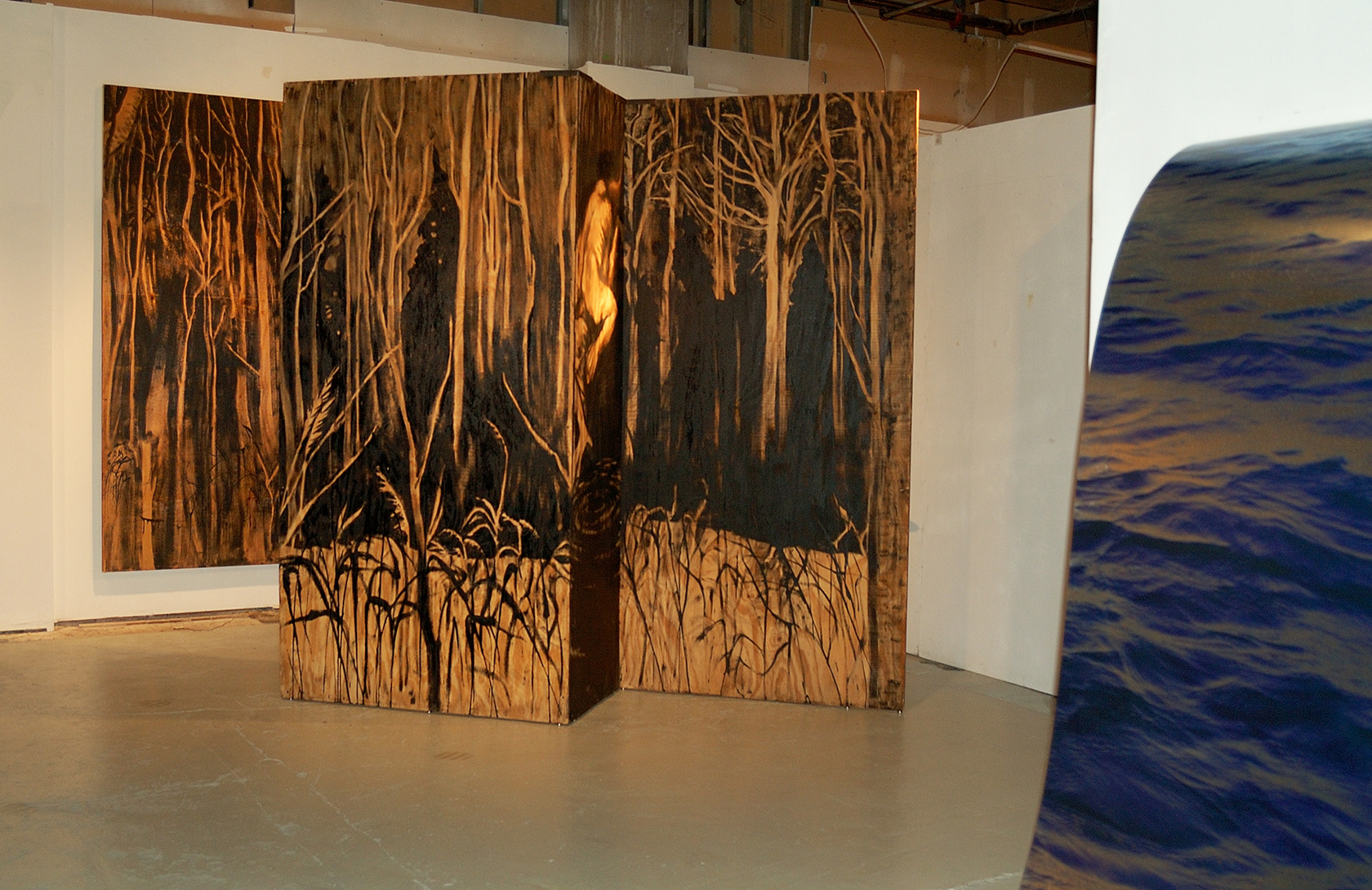  ​"Living Room" was a one-person show at Gallery 13, 811 LaSalle St., Minneapolis, MN. 
The animals are life-size, Corten steel, the panels, both freestanding 
and wall-hung, are each 4' x 8' plywood, painted in asphaltum. Another component of "Livin