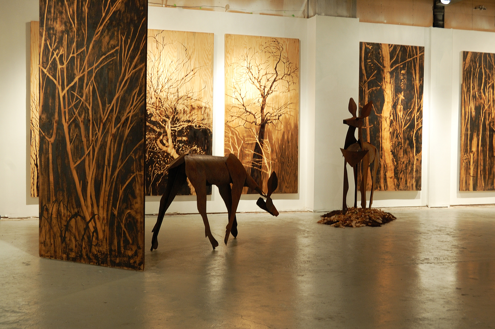  ​"Living Room" was a one-person show at Gallery 13, 811 LaSalle St., Minneapolis, MN. 
The animals are life-size, Corten steel, the panels, both freestanding 
and wall-hung, are each 4' x 8' plywood, painted in asphaltum.  