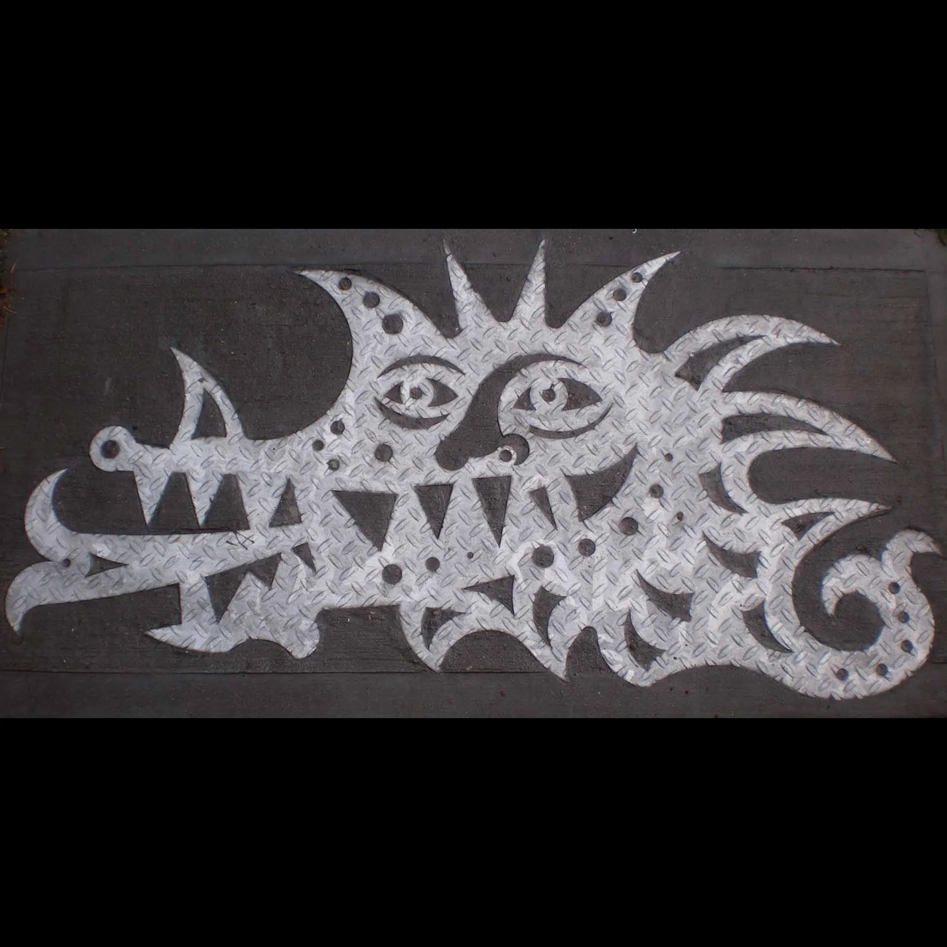"Dragon Head", laser cut industrial steel plate, 4'x2', 2002