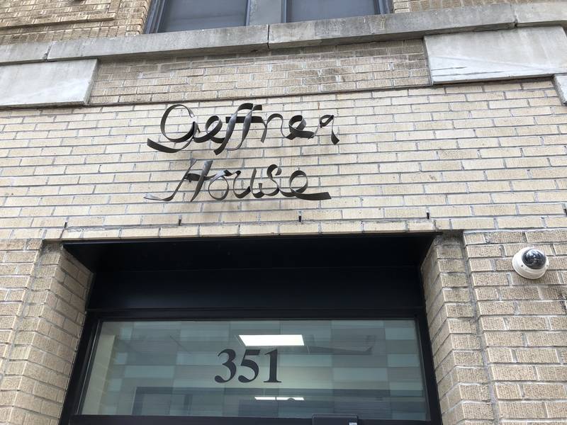 A custom steel “Geffner House” sign on the front door, designed and fabricated by local artist Linda Cunningham