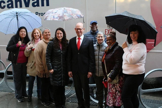 Project Renewal staff and supporters braved the rain to celebrate the new ScanVan