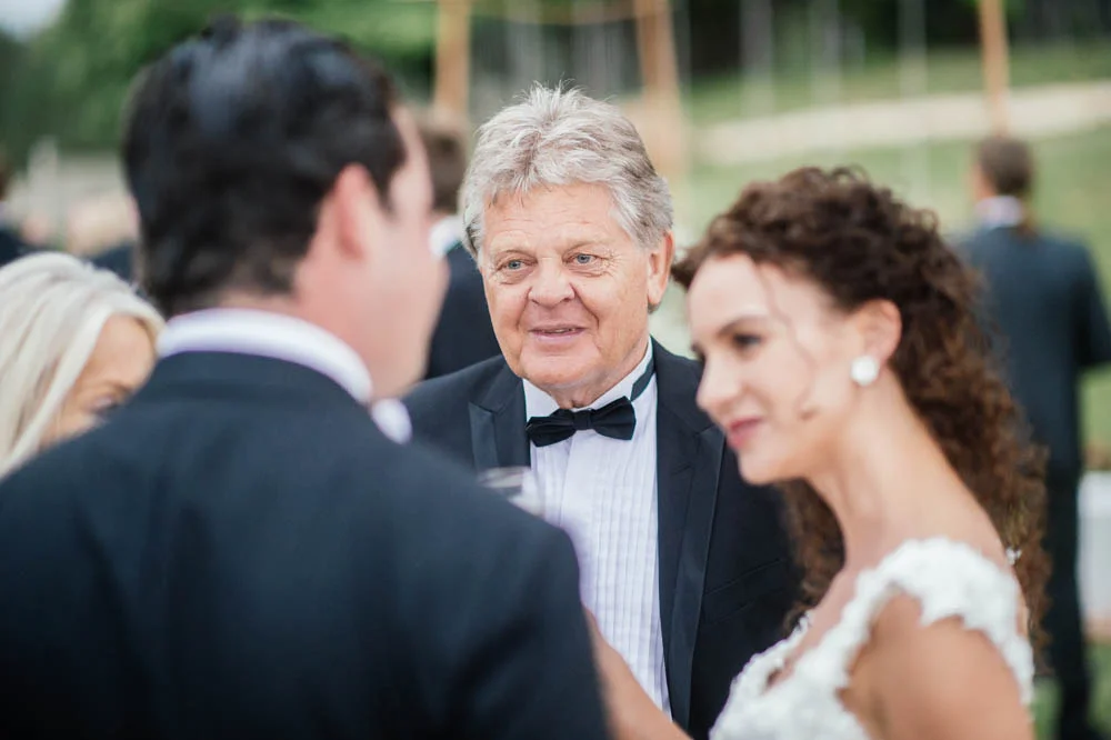 wedding-guests-talking-newlyweds.jpg