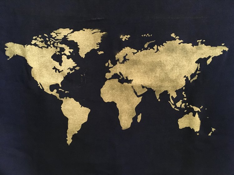  17. DIY Stenciled World Map Tapestry