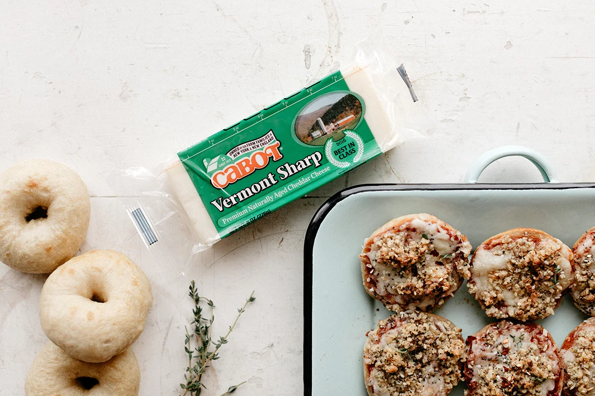 mini pizza bagels with sharp cheddar and walnut crumble — molly yeh