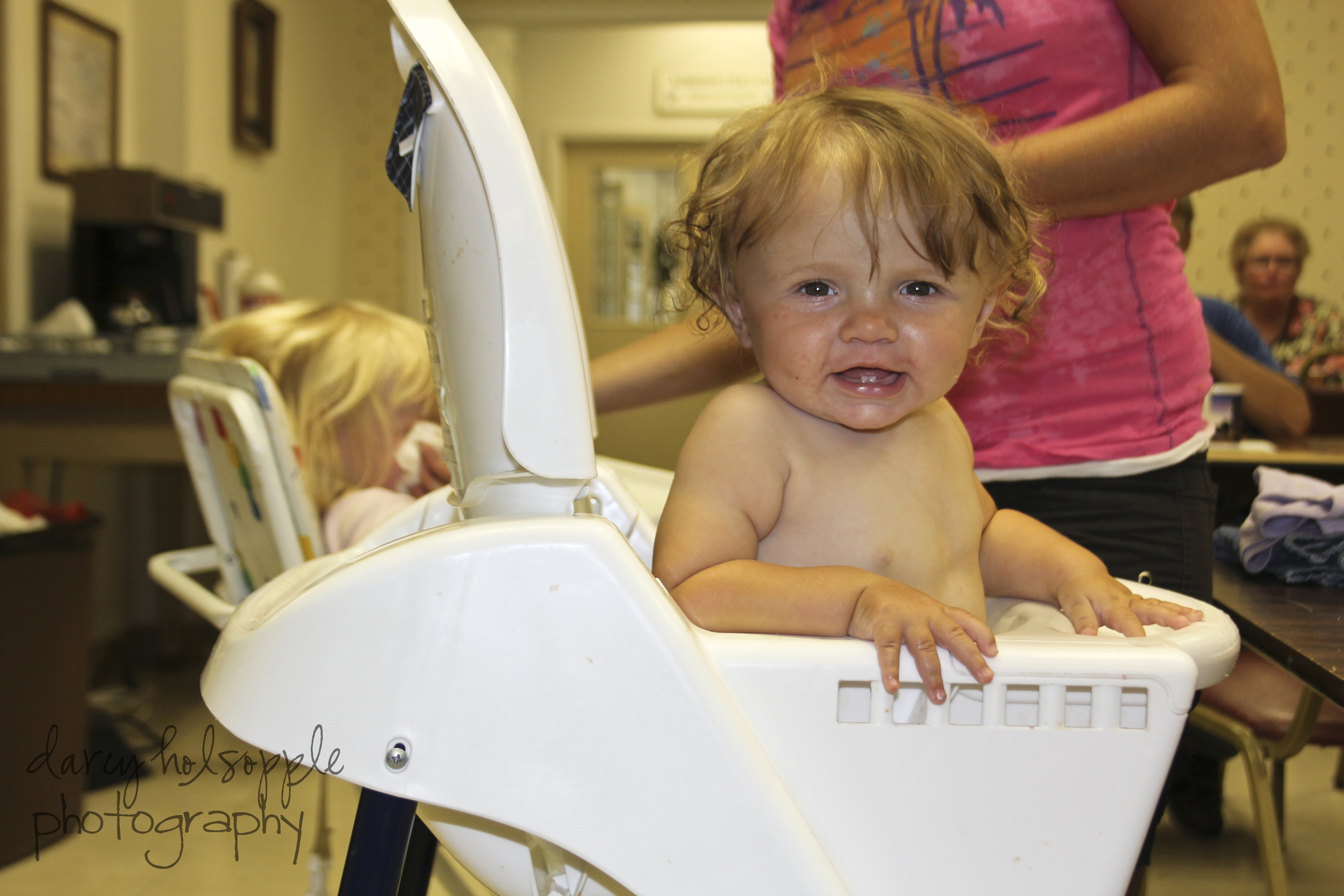  One of our youngest patrons giggles while enjoying lunch here at The Window 