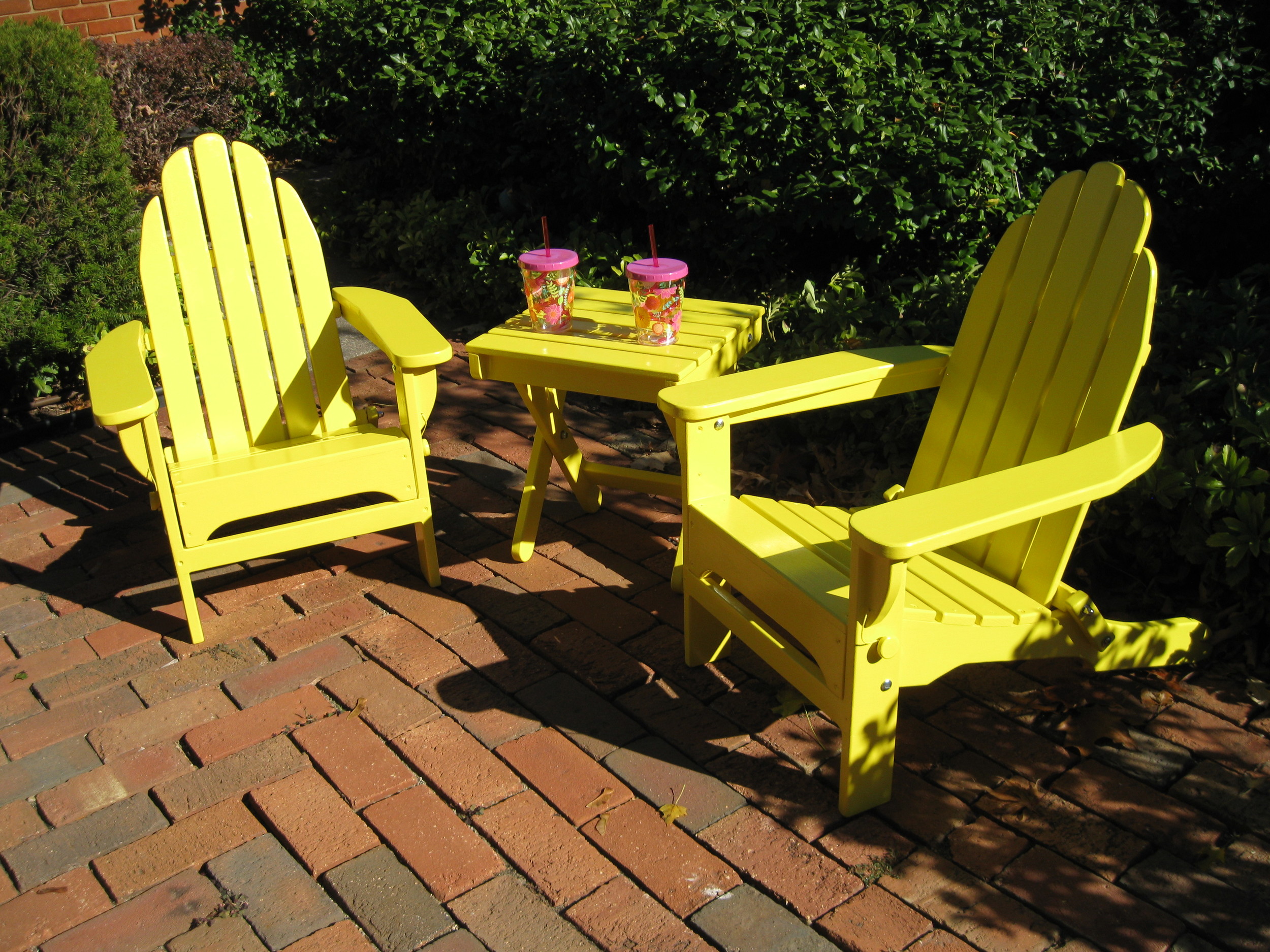 Child - size folding Adirondack chairs with matching table. Locally designed and handcrafted. SOLD Value: $200 Starting Bid: $120