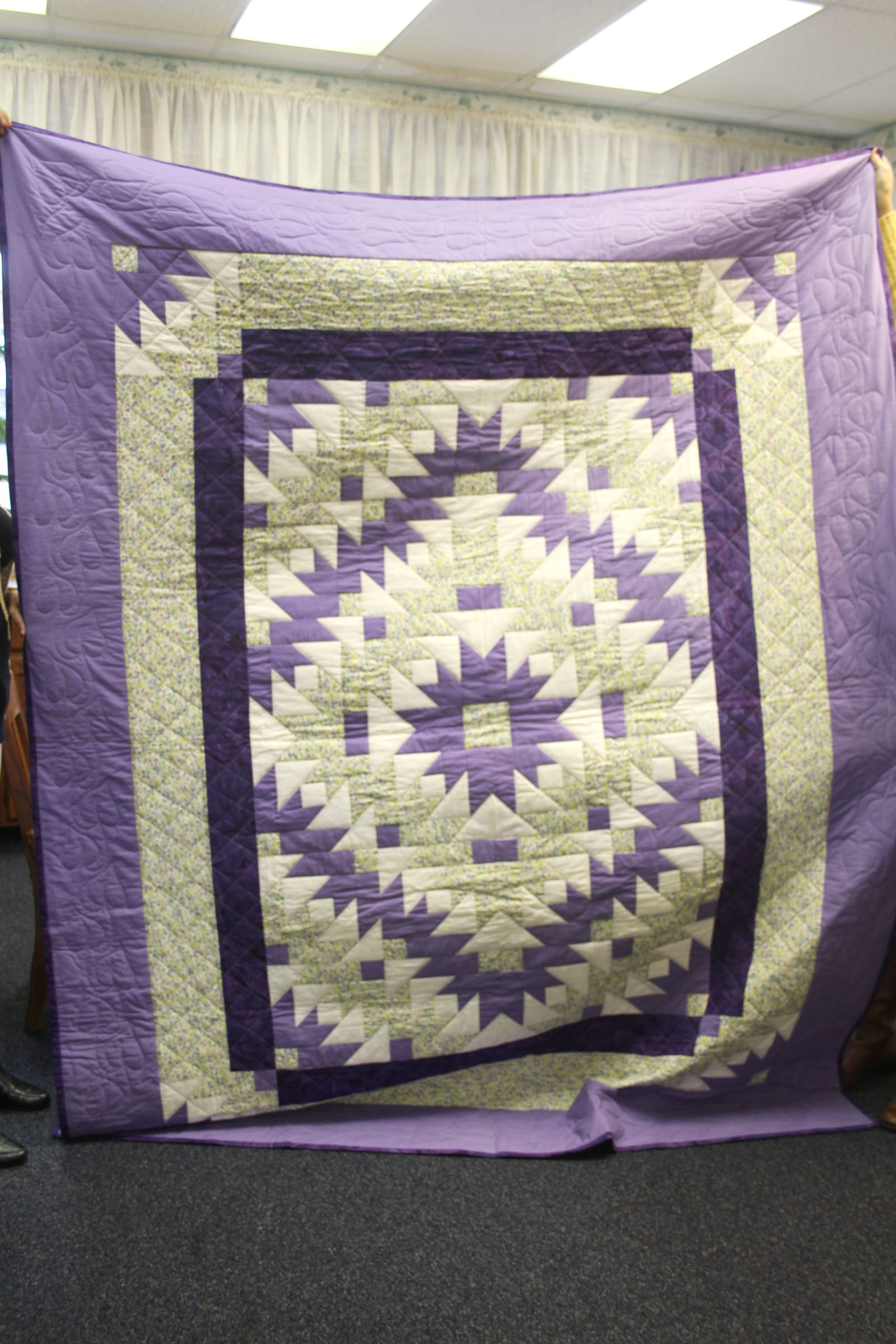 Handmade queen-sized quilt Value: $500 Starting Bid: $300