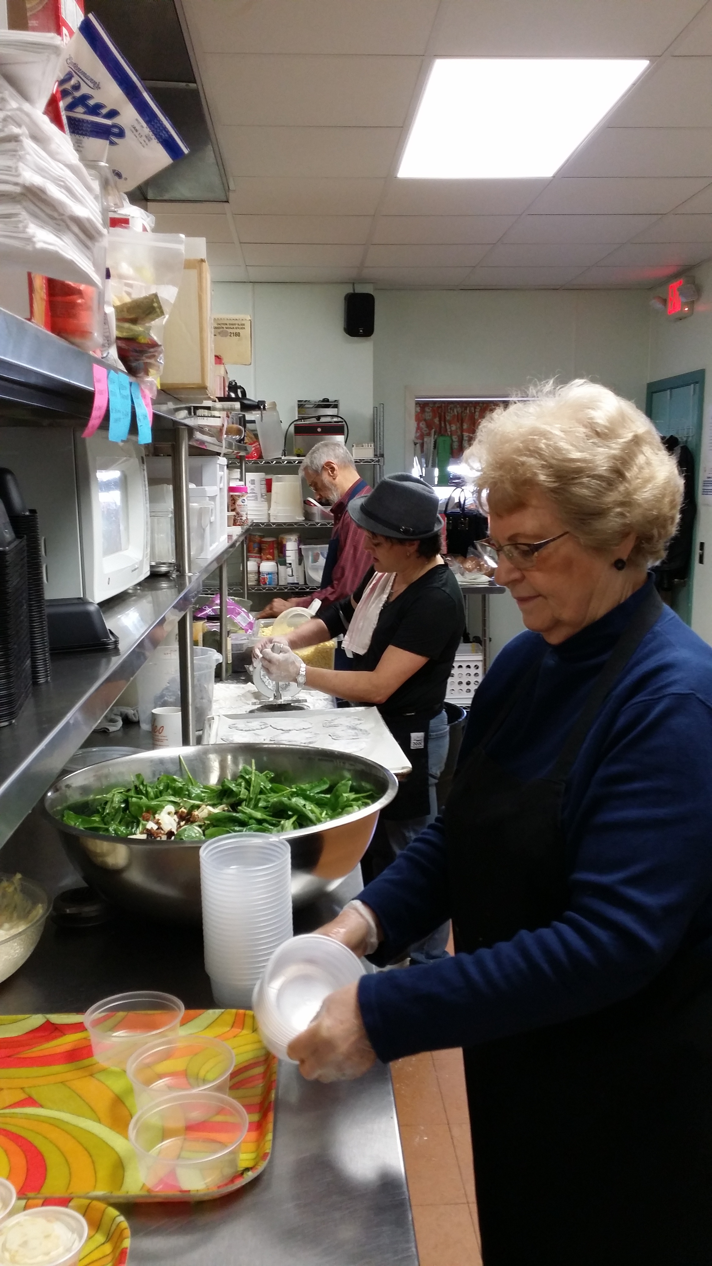  Kitchen staff preparing lunches for our Meals on Wheels program. 