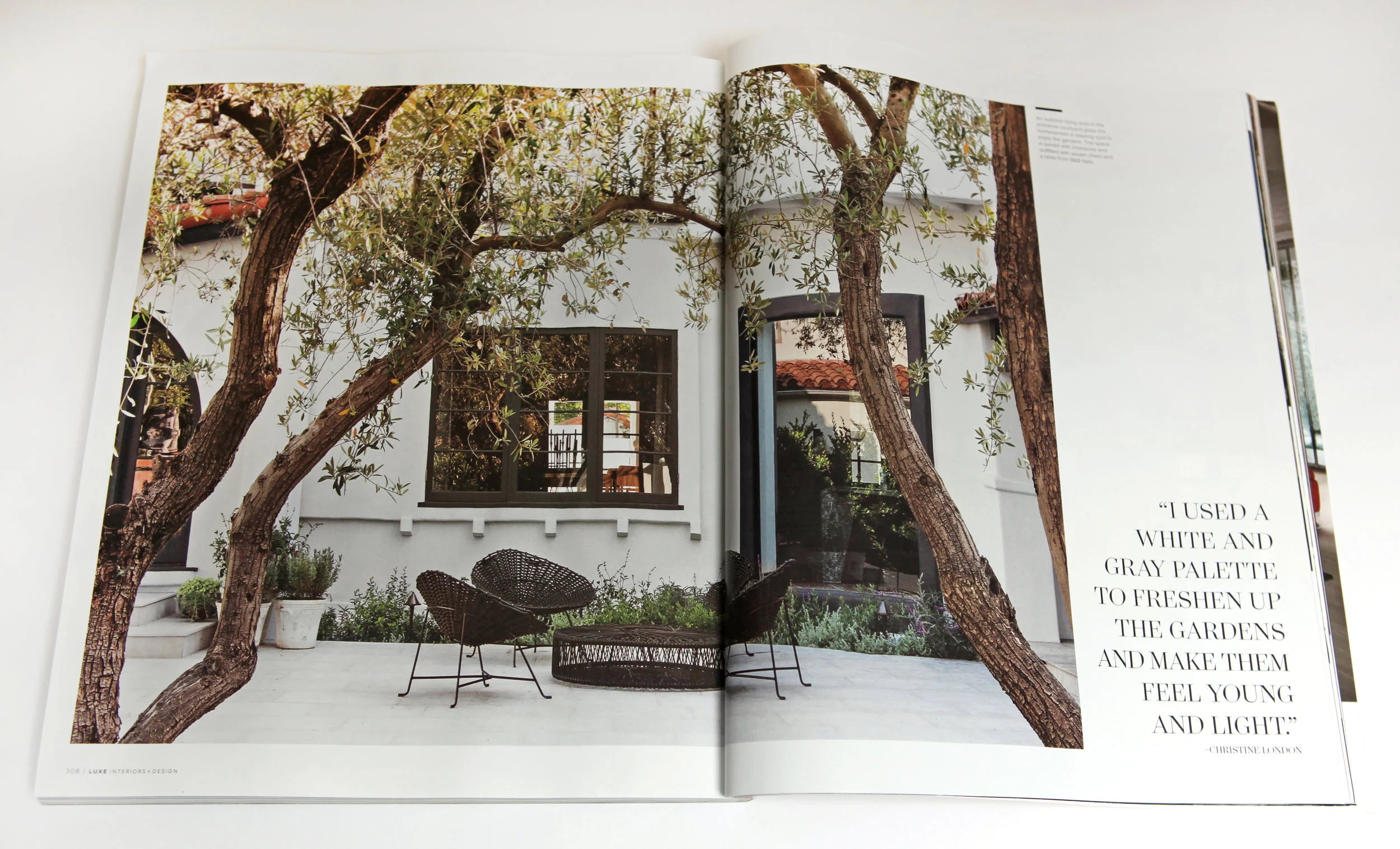 "I used a white and gray palette to freshen up the gardens and make them feel young and light." -Christine London