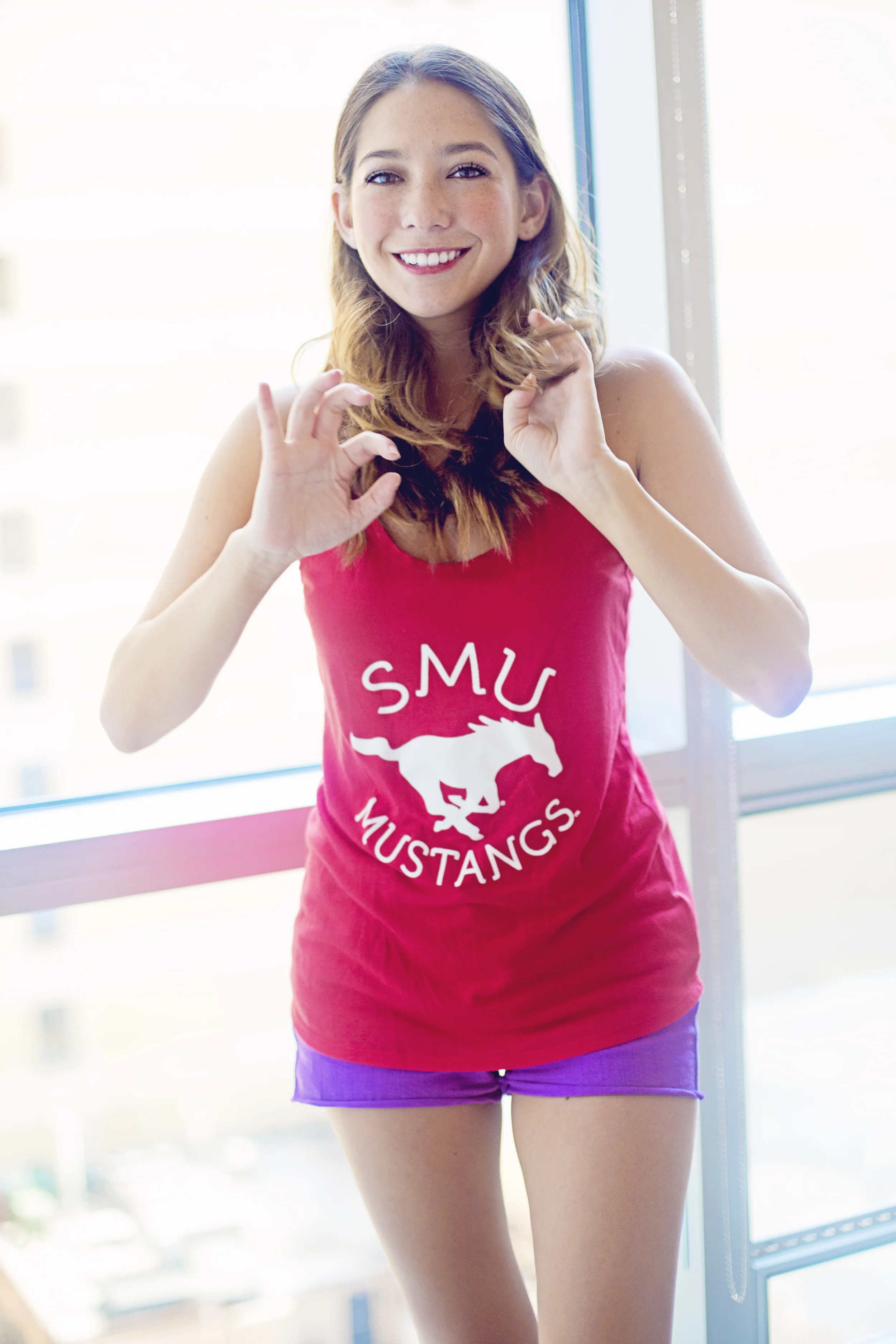 Simone in SMU shirt.jpg