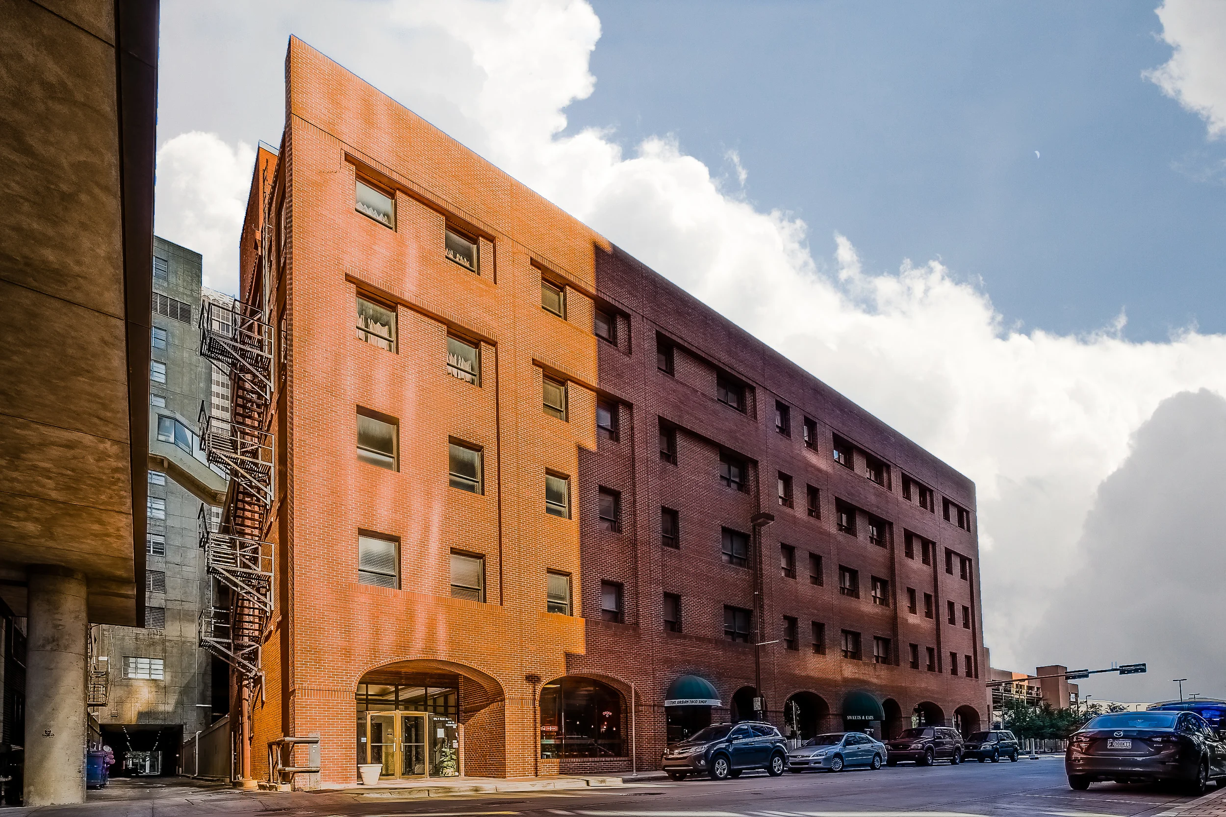An as yet unnamed building at Main and Robinson. Not sure if it has a name. But I love the red brick.