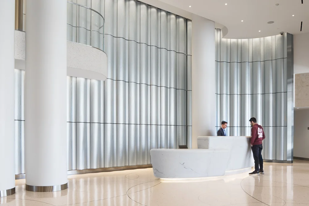 Custom designed reception desk at the lobby of the Pacific Gate Tower