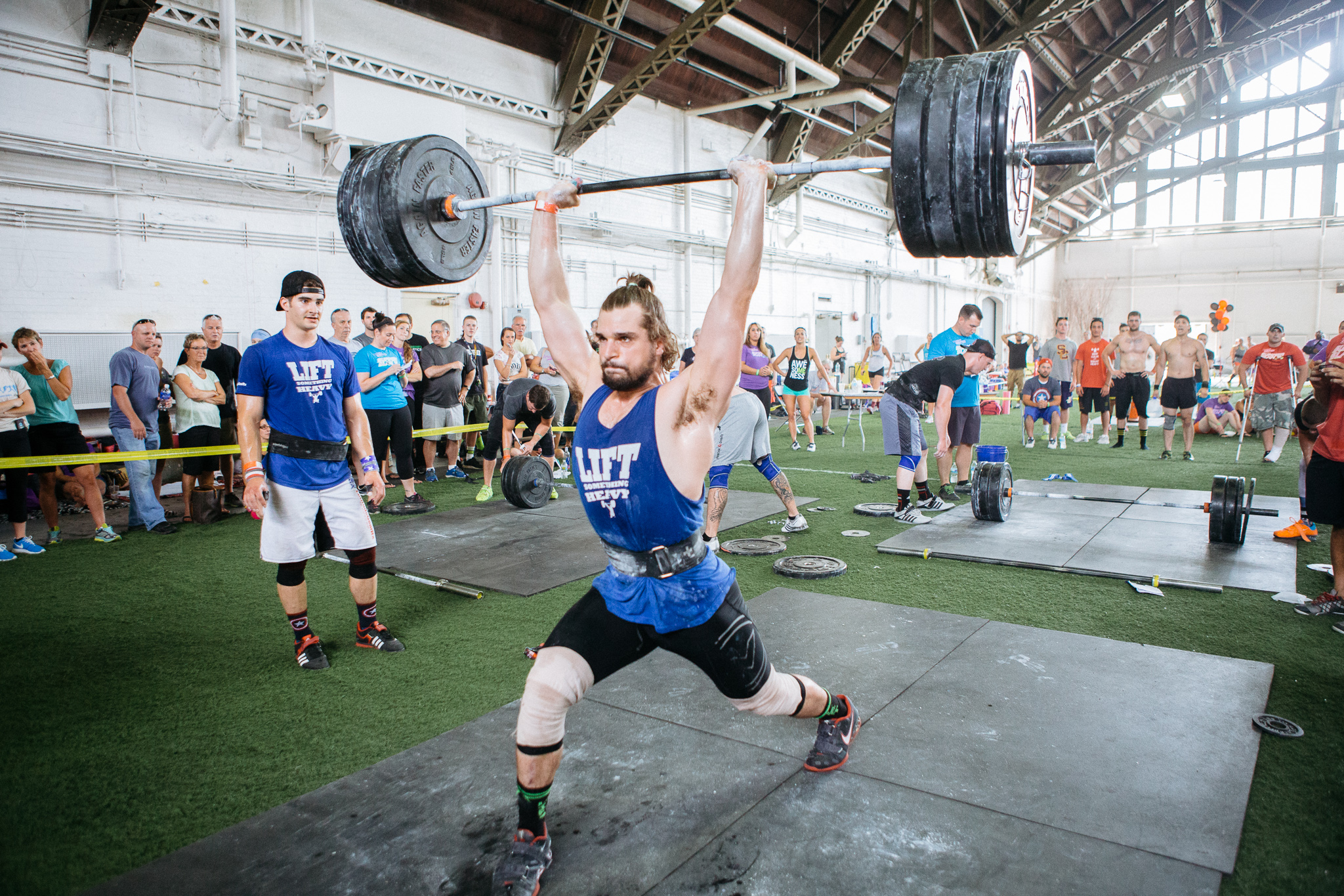 Special shout out to this dude who is pictured with 305 pounds up over his head. That's big boy weight.