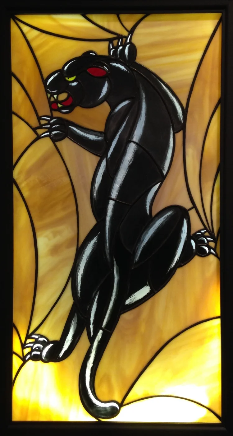 "PANTERA NEGRA" 16"X31" (SIZE OF GLASS ONLY) Foiled stained glass, kiln fired glass paint, & LED lights $2500