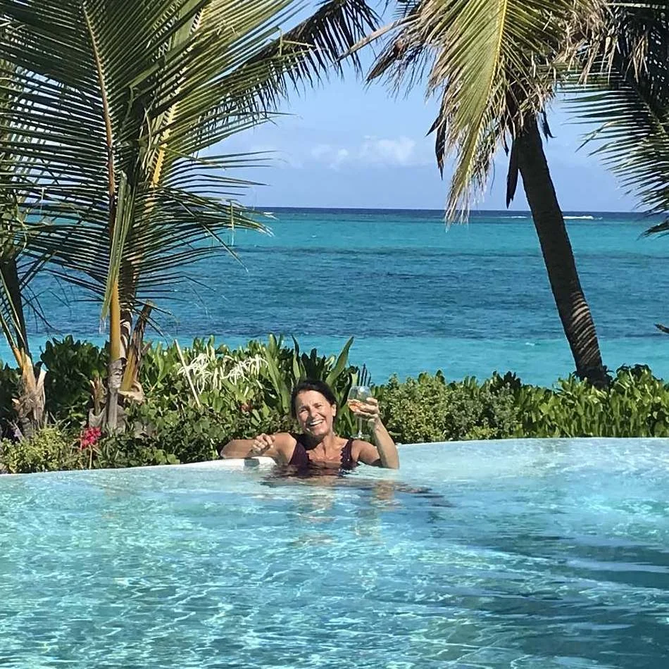 Another happy client enjoys the many benefits of Villa Oasis and the beauty that is Grace Bay!