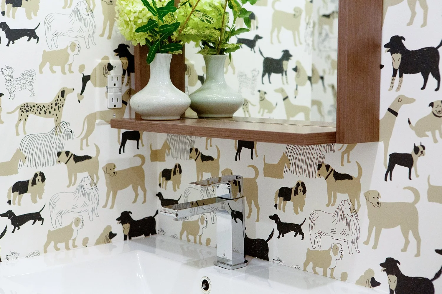 Small scale wallpaper pattern in small bathroom.