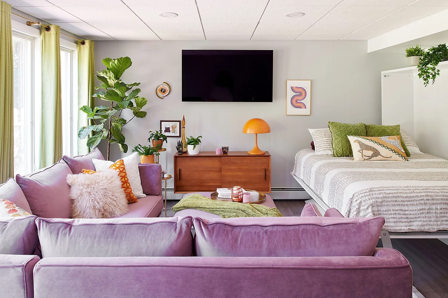 Vibrant living room with a Murphy bed.