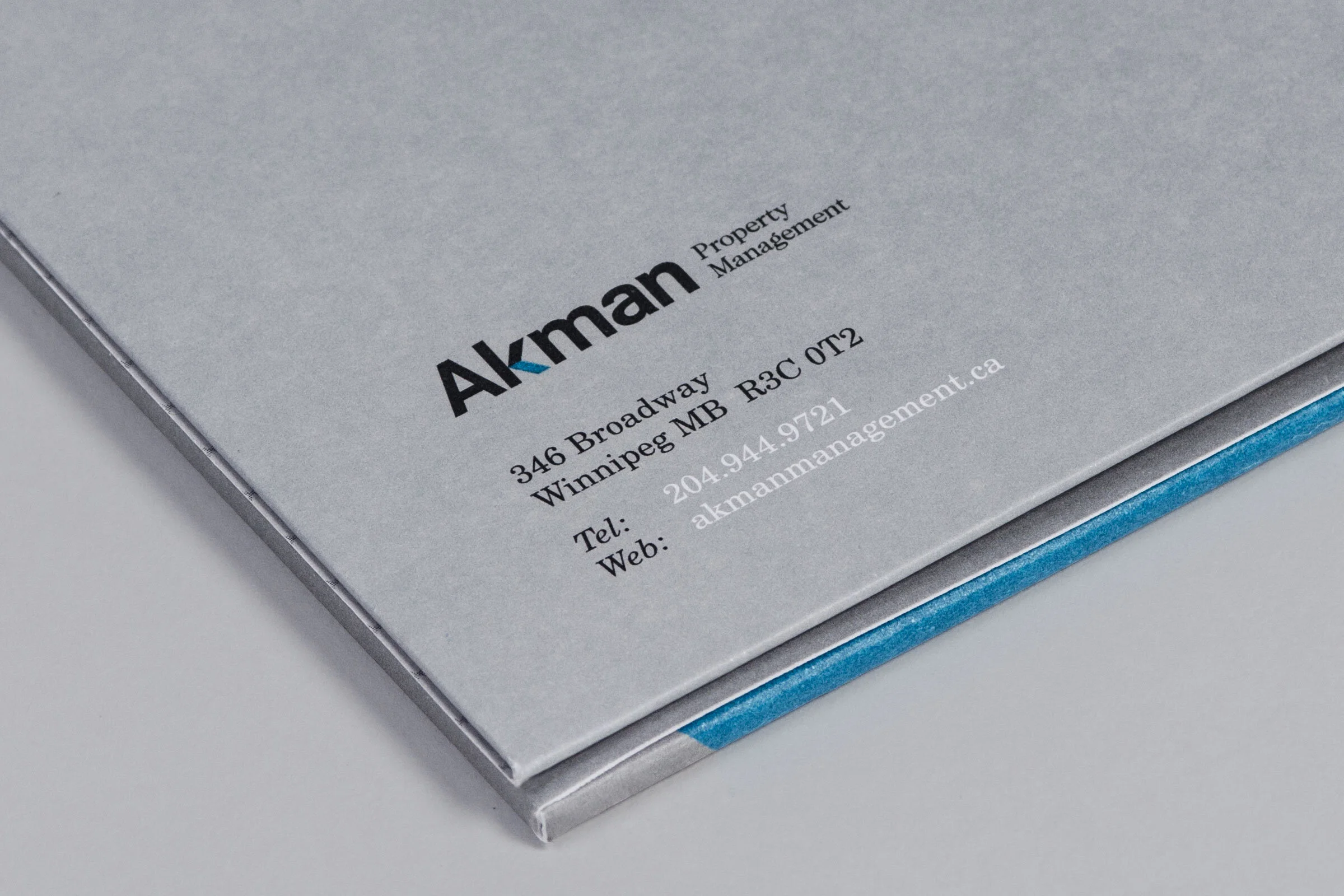 akman-rebrand-folder-detail.jpg