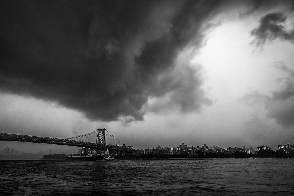 "Storm over Williamsburg" June 2014, Brooklyn, New York Fujifilm XPro1, 14mm, f/8, 1/40, ISO 1600 In June, I drove to Grand Ferry Park in Williamsburg to photograph an event called the "World Naked Bike Ride." It was going to be a bizarrely great photo op. But nature had other plans. Not more than 15 minutes before the official meet-up time for naked bike riding, this storm rolled in. I stayed around just long enough to take a few dramatic shots before the sky opened up, dumping a monsoon of rain across the city. I'll never know if they went ahead with the naked bike ride. A day after I posted this photo, I got a notification that one of my favorite National Geographic photographers, Jim Richardson added it as a favorite on Flickr, which is the photography equivalent of Frank Sinatra stopping by to compliment your karaoke performance. 