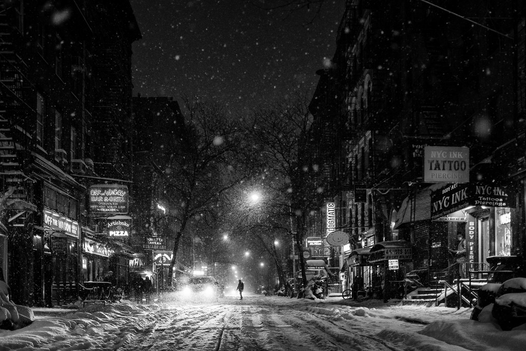 "MacDougal Street Snowstorm" January, 2014, New York City Fujifilm X100s, 23mm, f/2, 1/125 seconds, ISO 2500 This year was one of the ten snowiest winters on record for New York City. So there was no shortage of picturesque snowglobe-quality photo opportunities. But of all the winter photos that I took this year, this shot from Greenwich Village is my favorite. I took this photo while kneeling in the center of MacDougal Street. I snapped a few shots, played around with settings, and tried to compose something interesting. But then this guy stepped off the curb in the distance and crossed into the middle of street. Sometimes it's that tiniest of details that makes all the difference. The other photos from this series are totally unremarkable. This one is magic. 