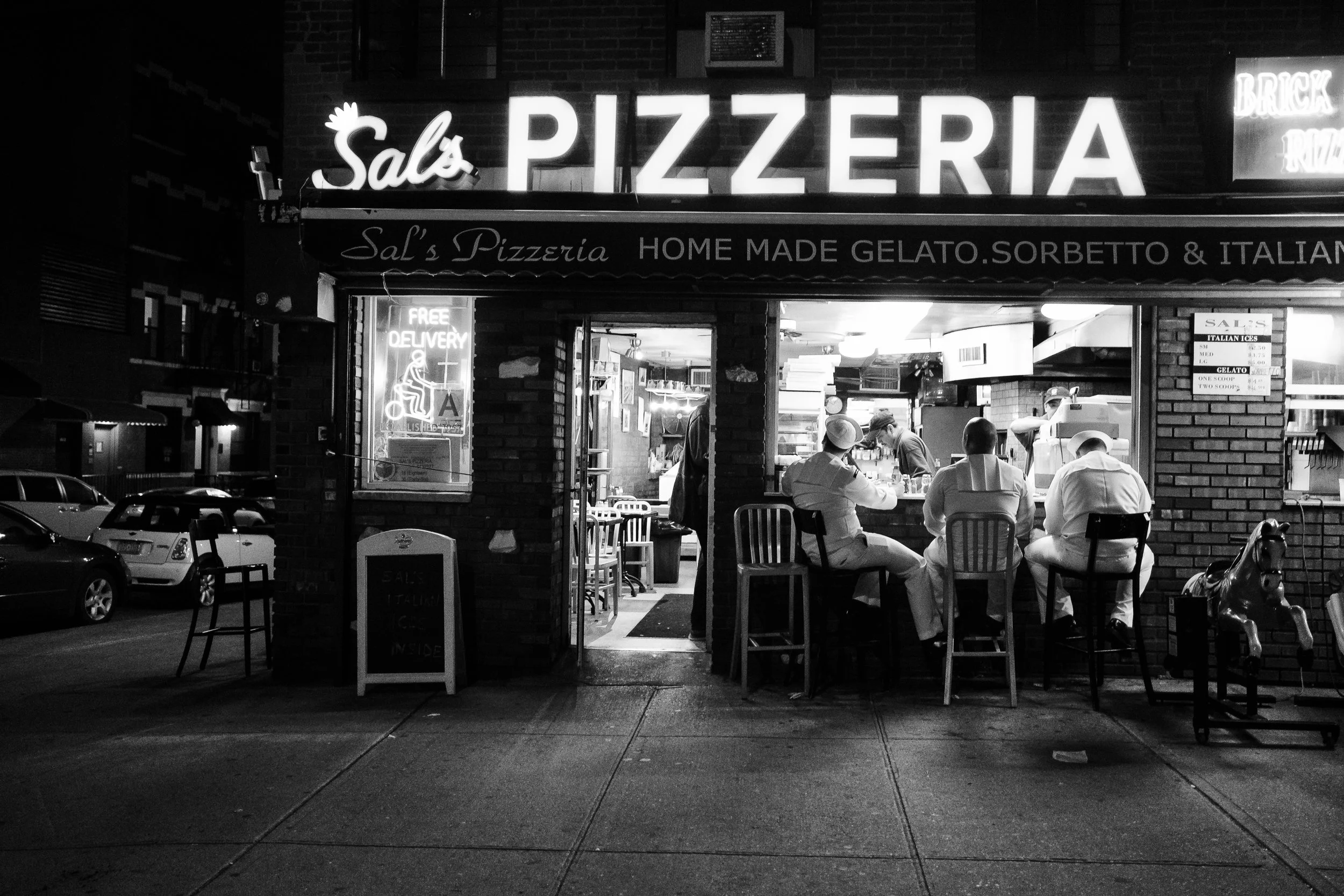 "The Navy and the Pizza." May 23, 2017. Cobble Hill. Brooklyn, NY. Fujifilm X-Pro2, 23mm, f/2.5, 1/125, ISO 5000