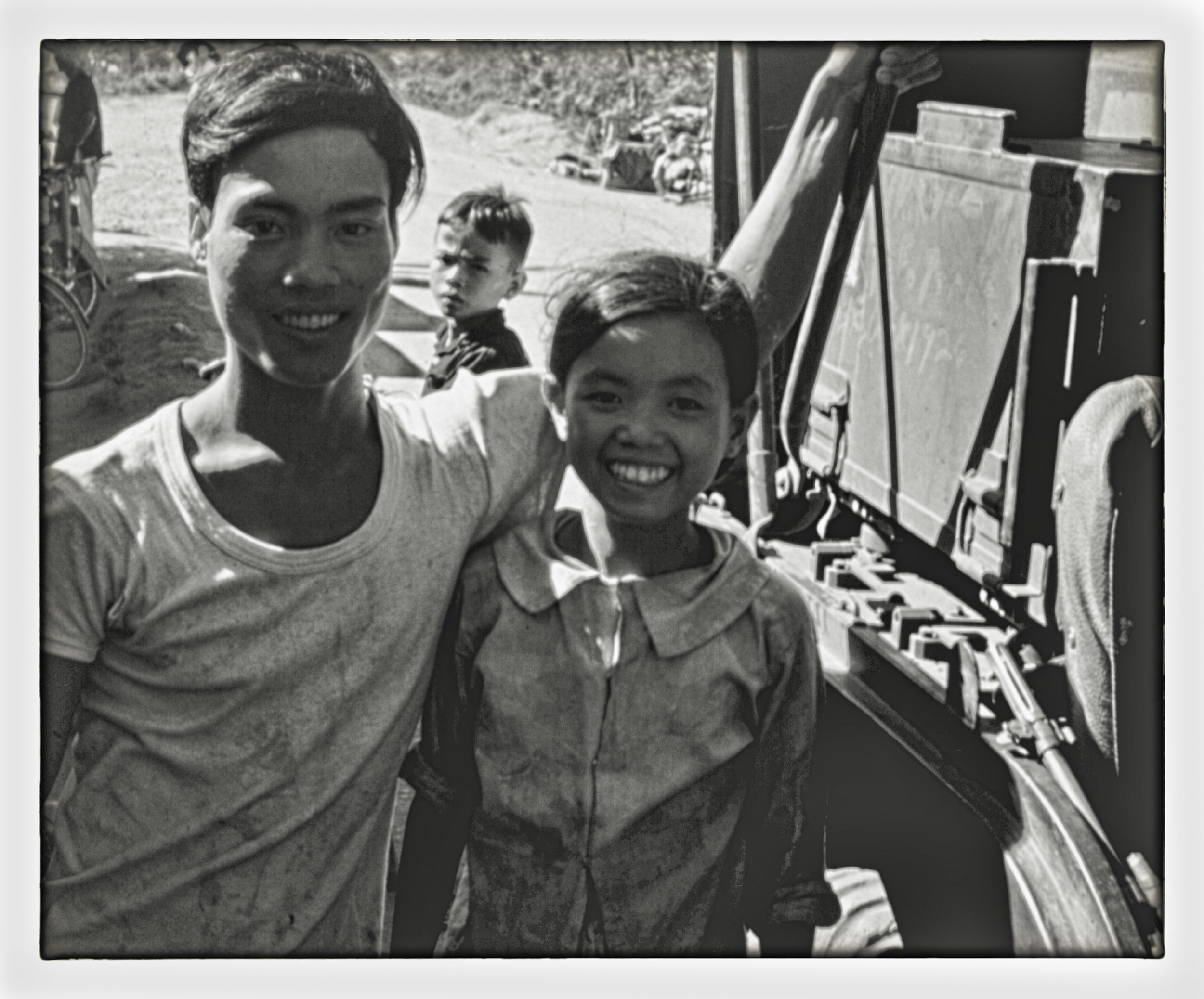 vn24 boy and girl at jeep-2.jpg